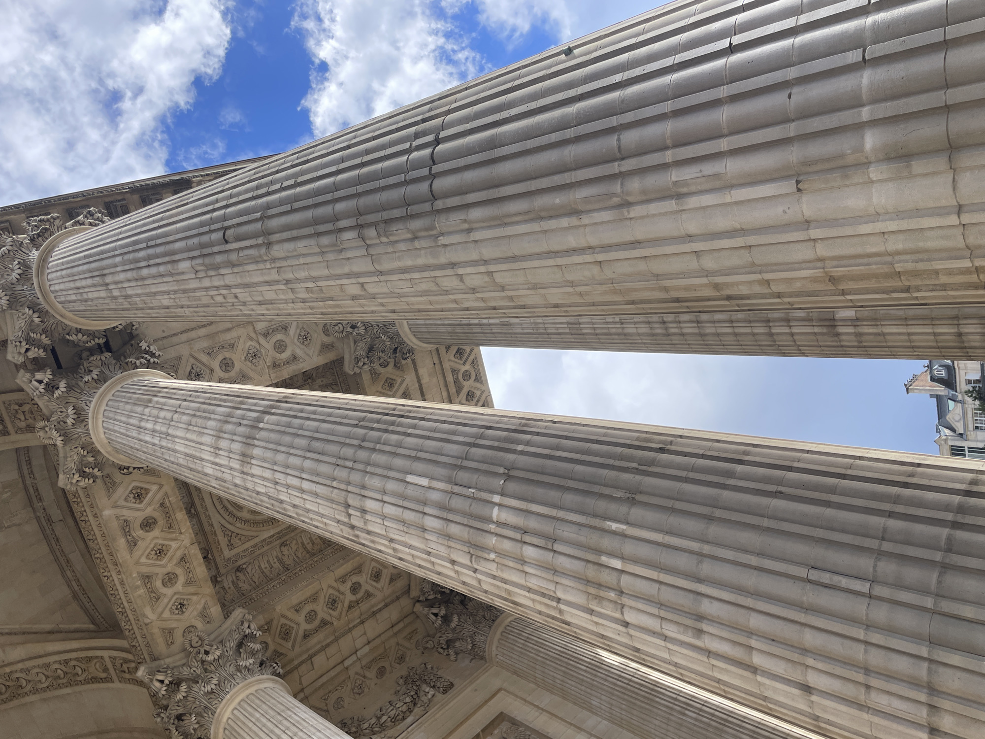 Tourist captures Paris landmarks during afternoon stroll