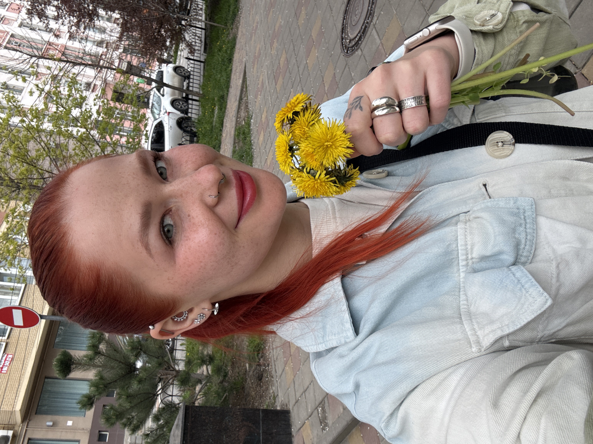 Boy with rainbow scarf visits fountain in Rostov-on-Don
