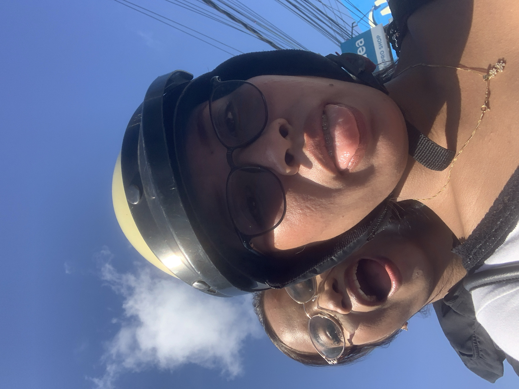 Motorcycle riders document sunny morning journey through Denpasar streets