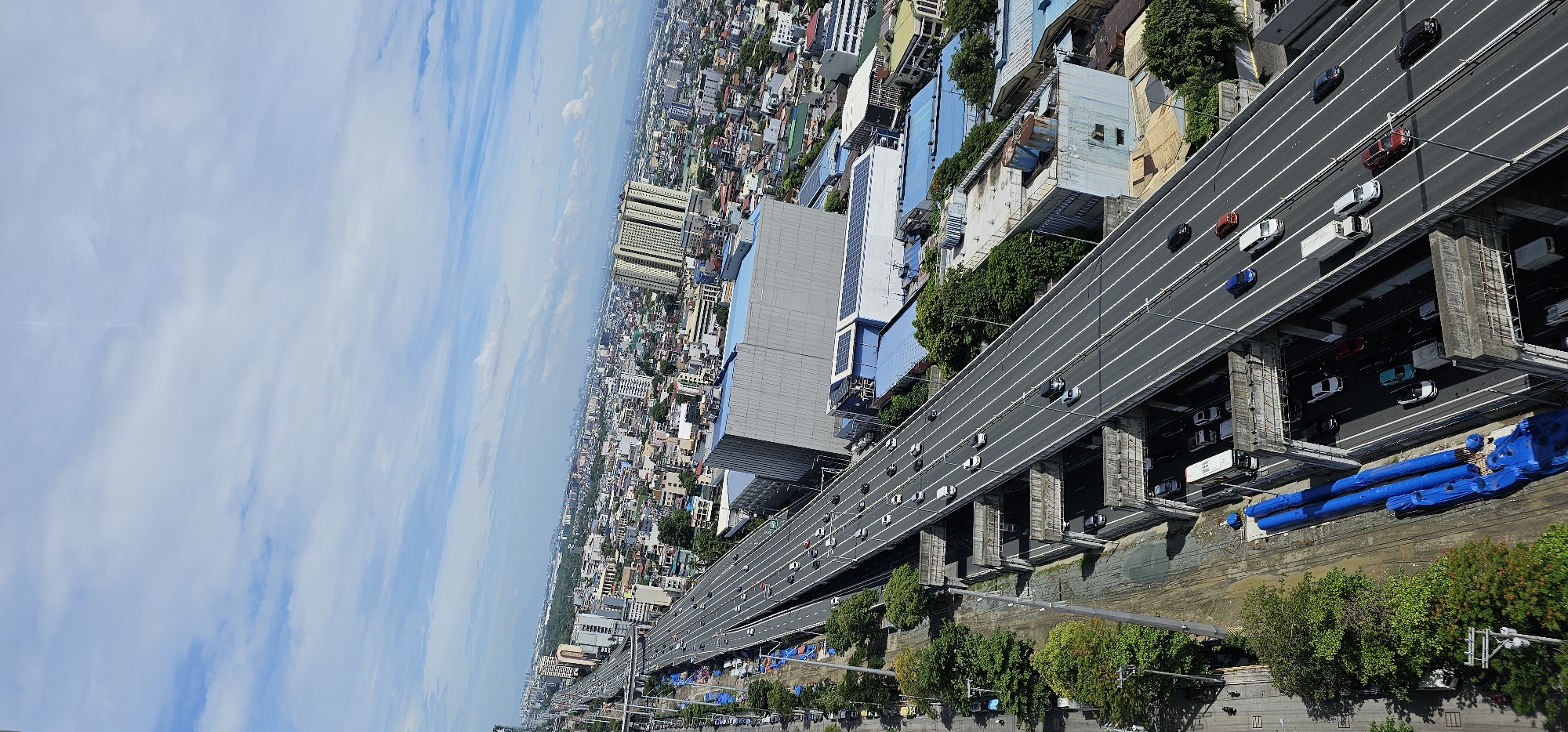 High-angle views of Makati's highways, towers, and skyline