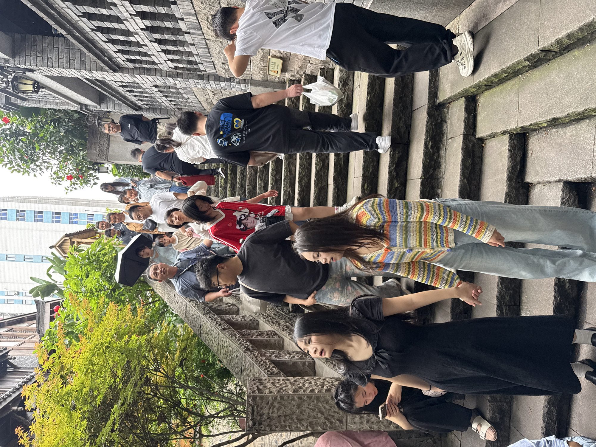Morning crowds pack historic Yuzhong District streets and cafes