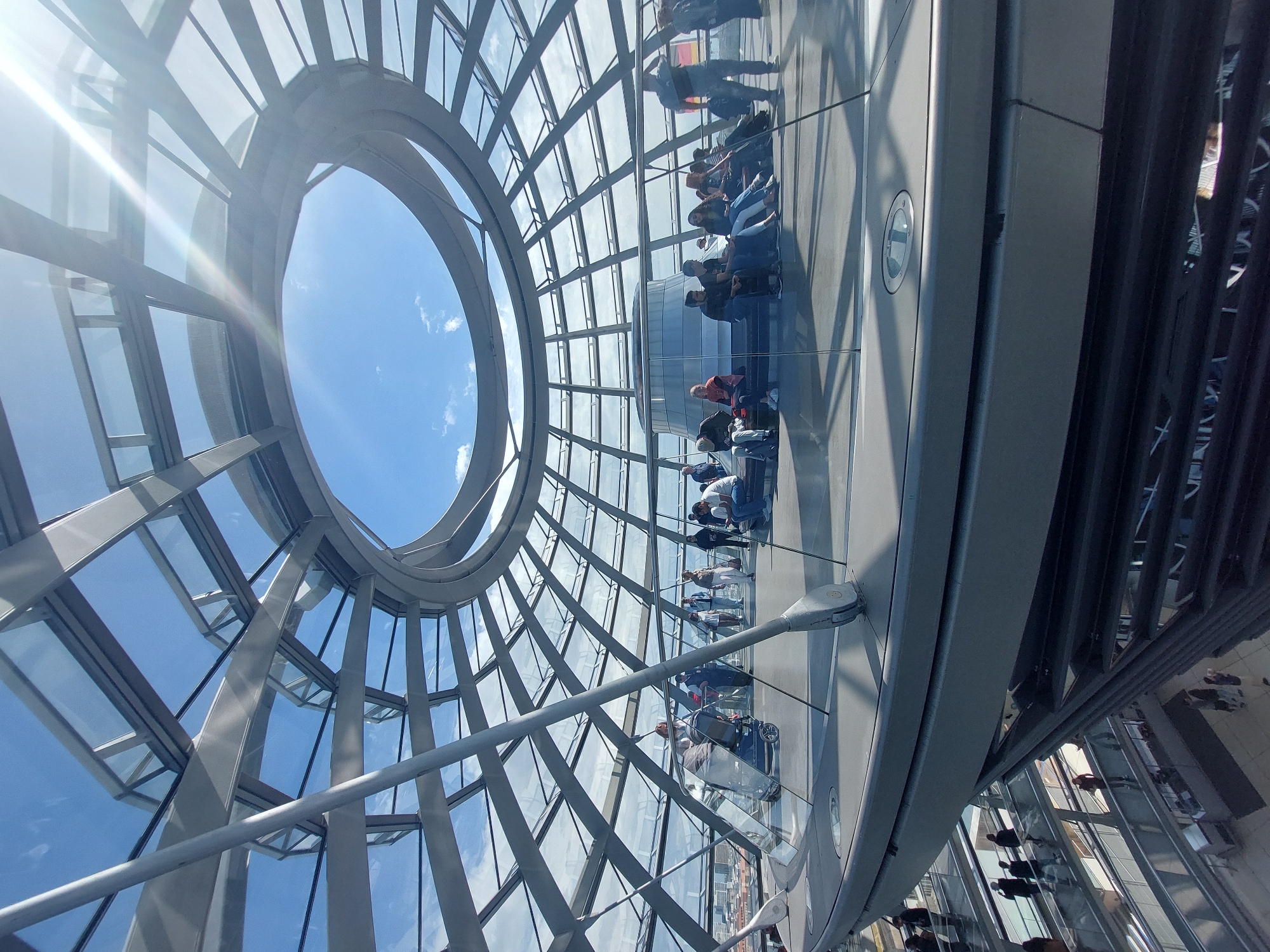 Tourist explores Reichstag dome and Berlin government district