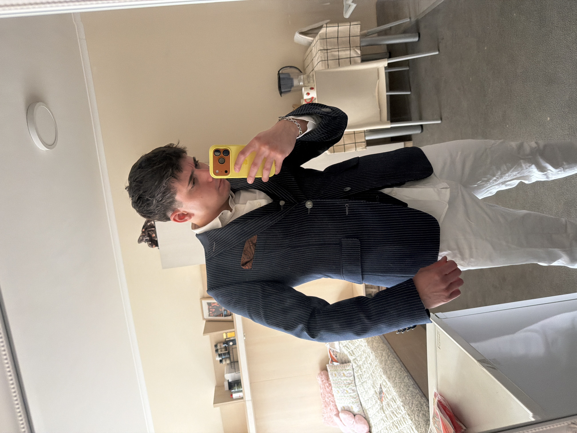 Person documents morning routine getting dressed in formal wear
