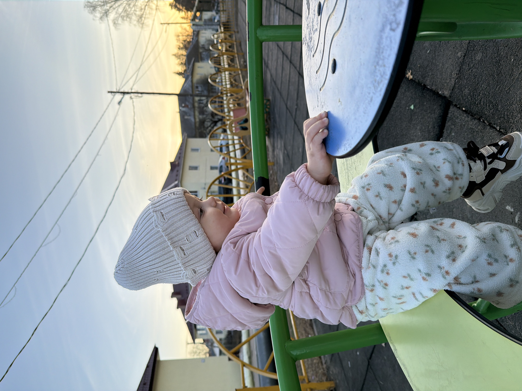 Family day in Reshetnikovo: toddler plays, woman drinks protein shakes