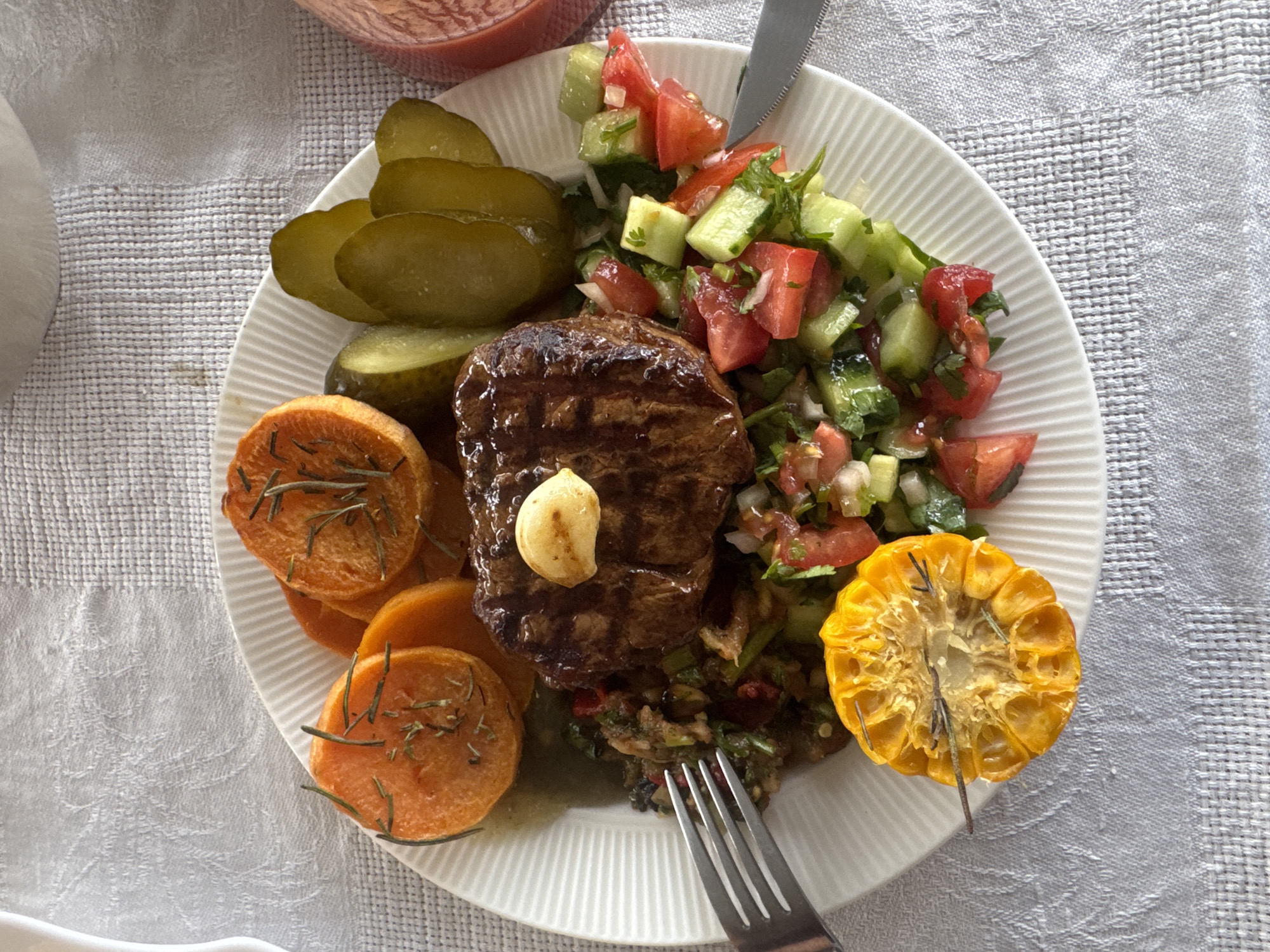 Home cooking of grilled steak meal in Ptichnoye, Russia