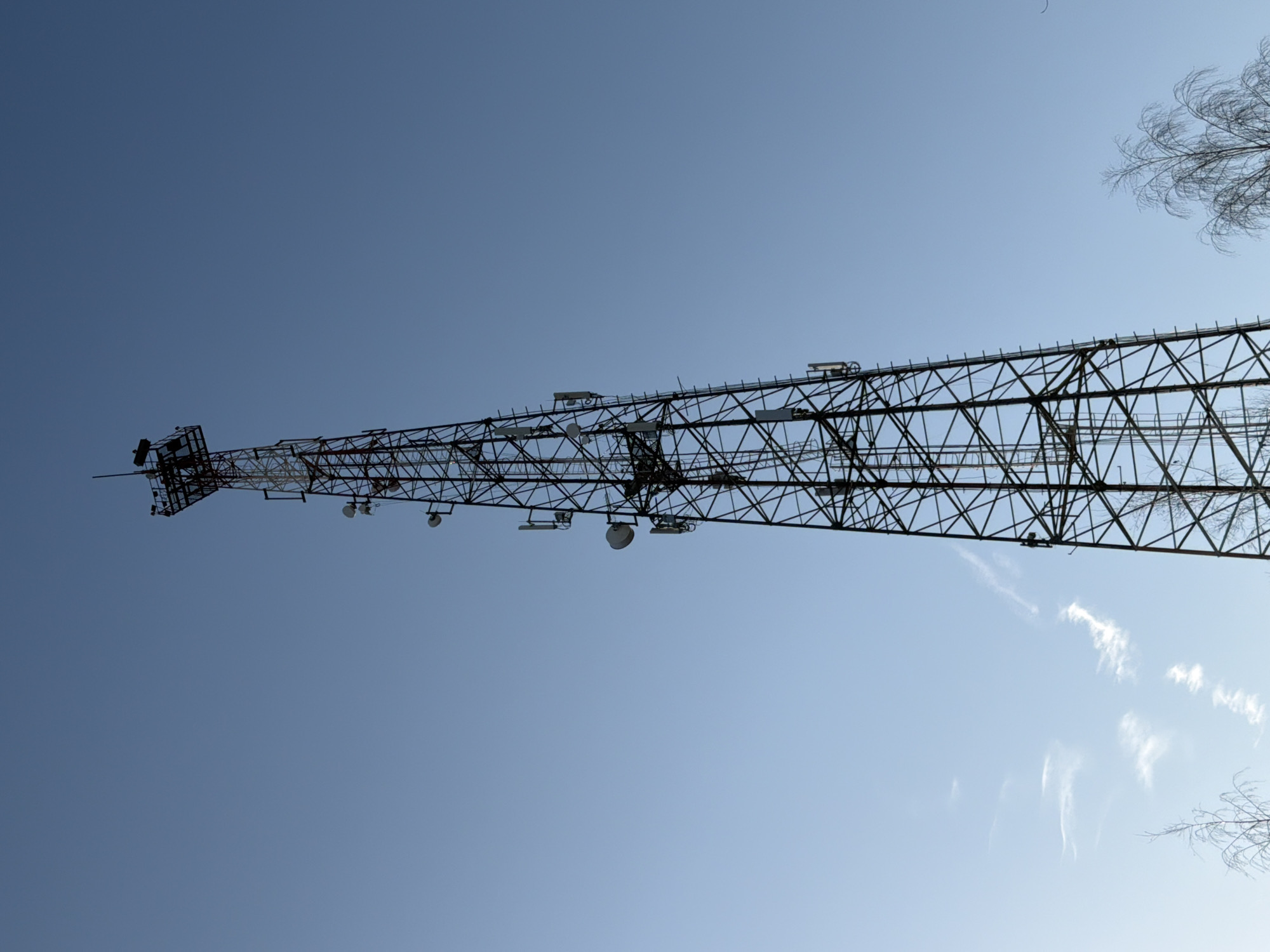Infrastructure towers documented under clear skies in Chaikovsky