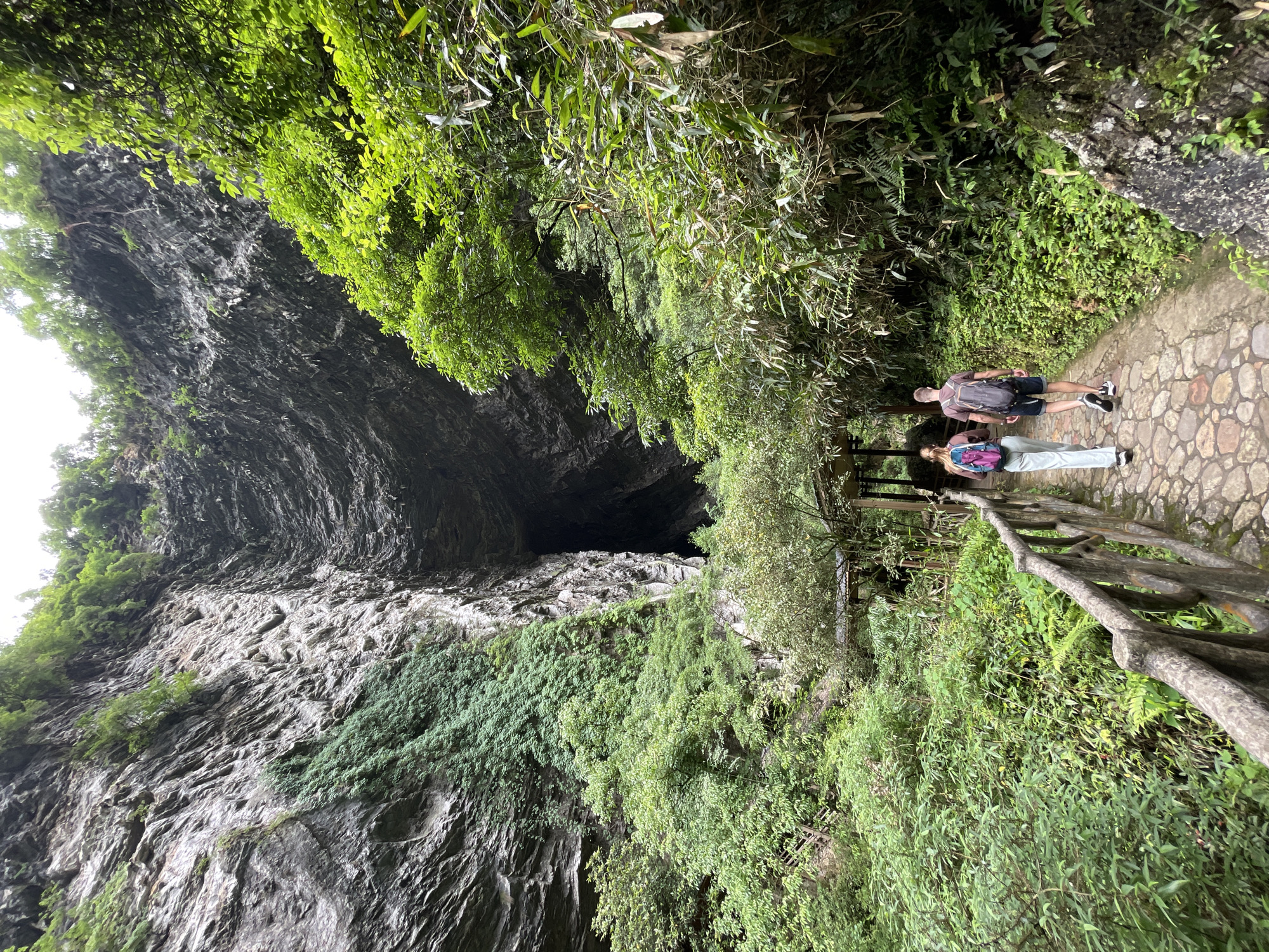 Tourists visit Erwang Cave amid turquoise rivers in Sanguansi