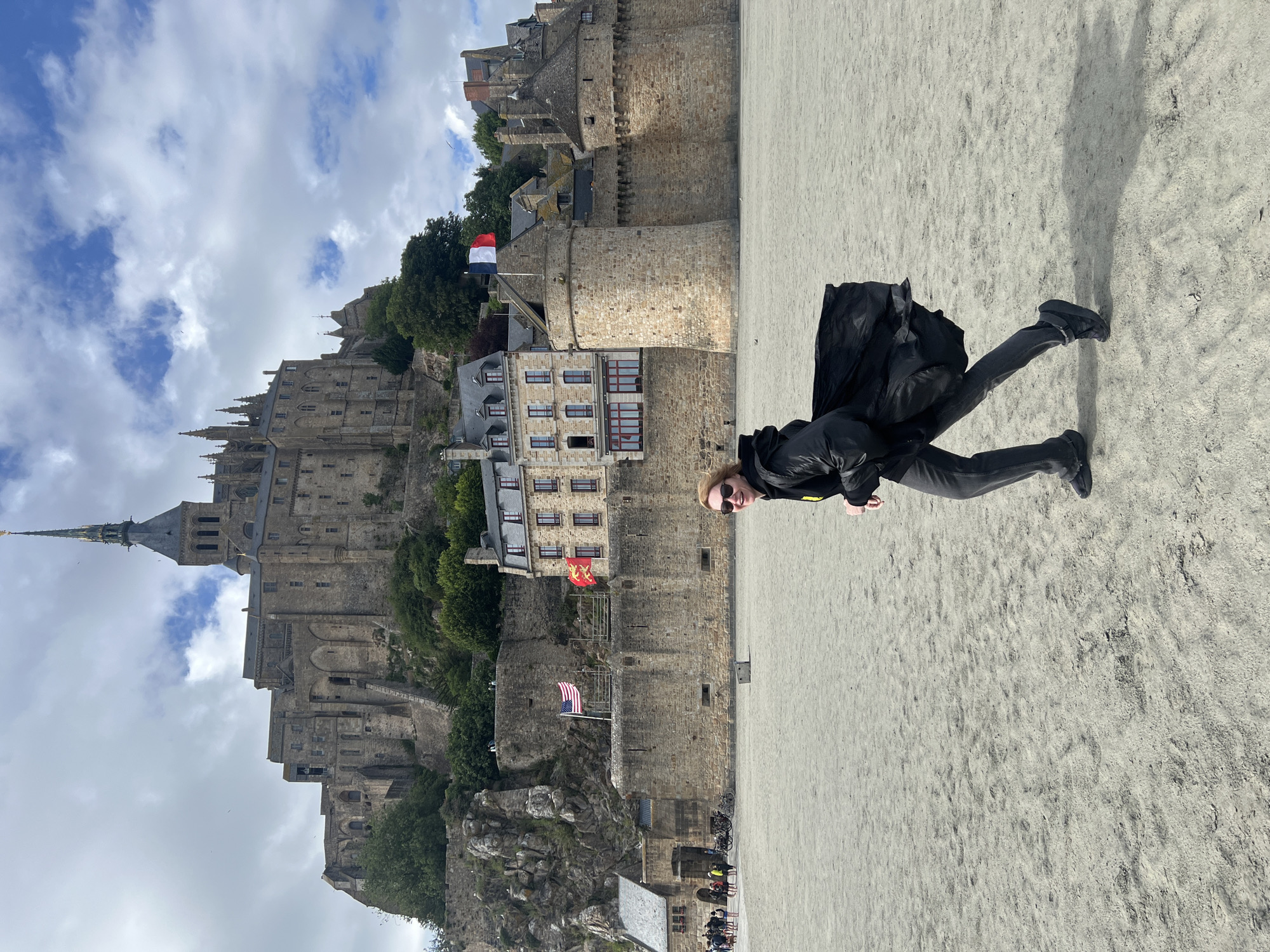 Afternoon scenes captured at Mont-Saint-Michel: runner, nesting seagulls, architecture