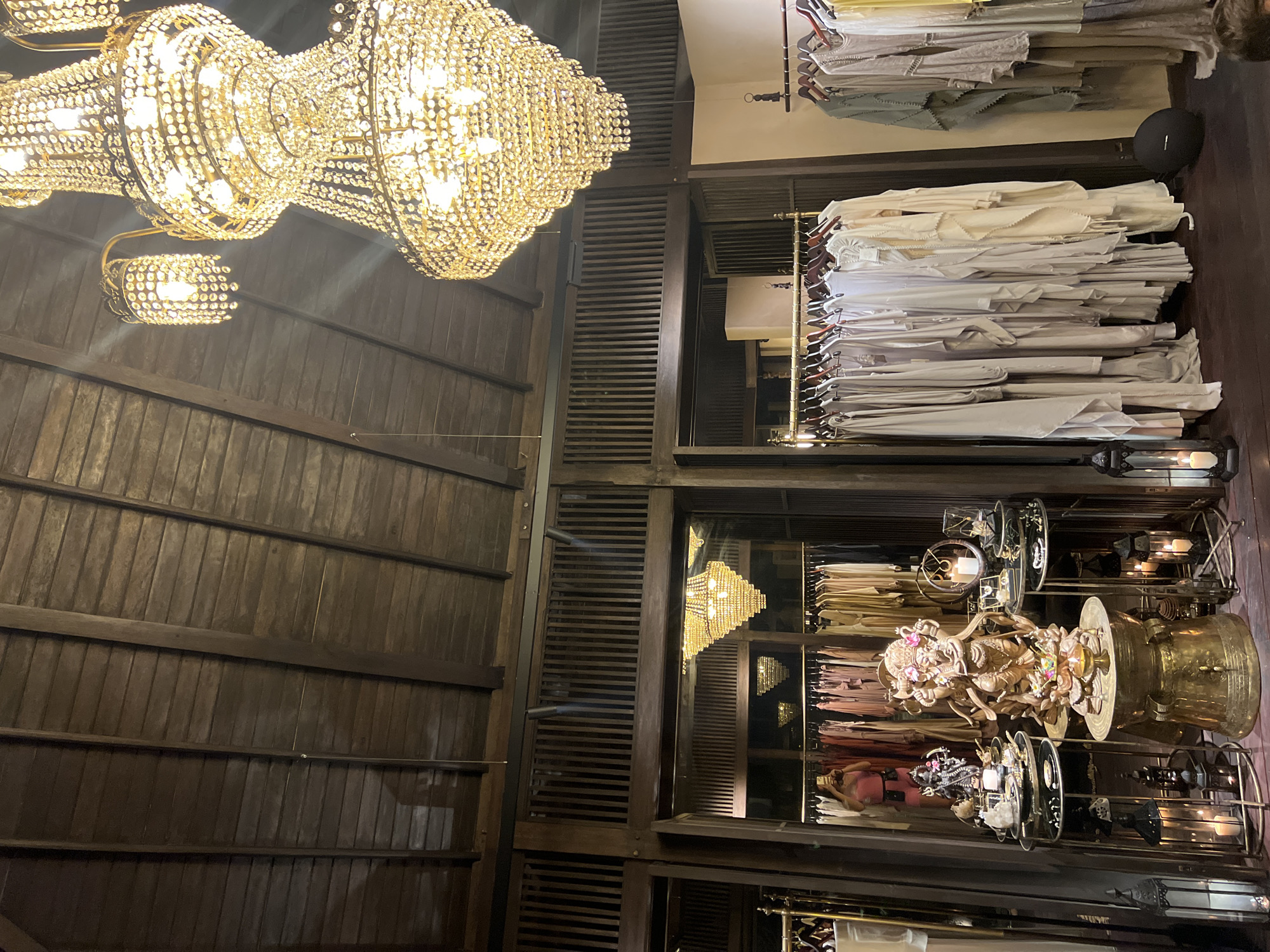 Woman shops, takes selfie at upscale Ubud boutique