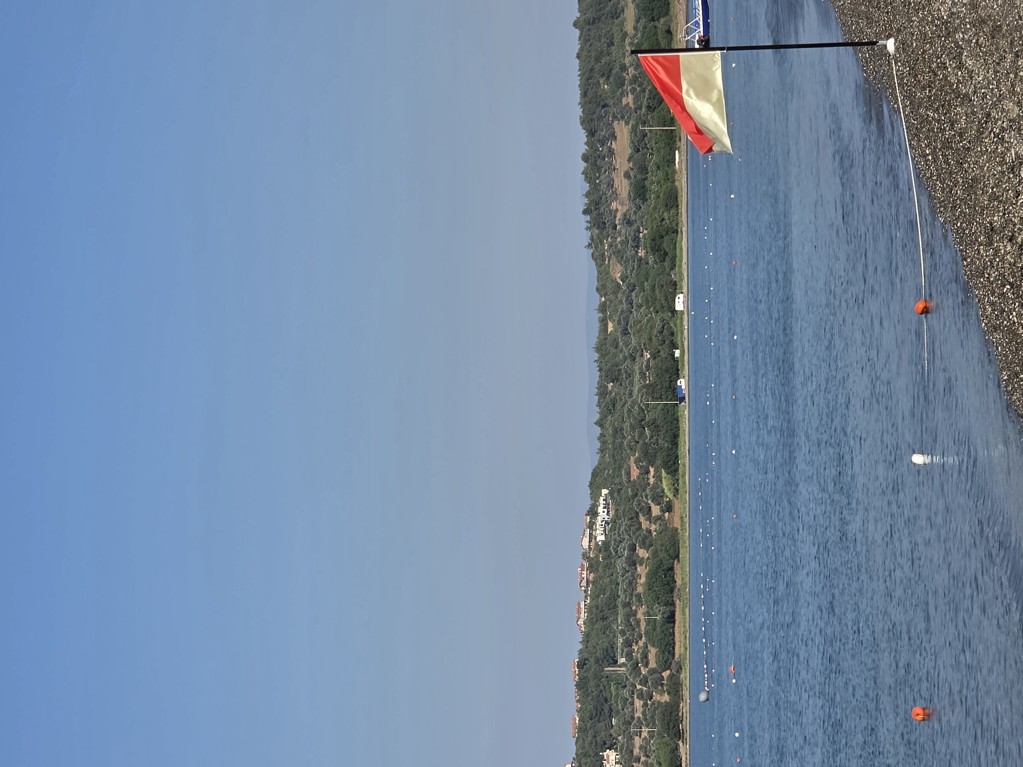 Quiet morning on Seferihisar's Aegean pebble beach