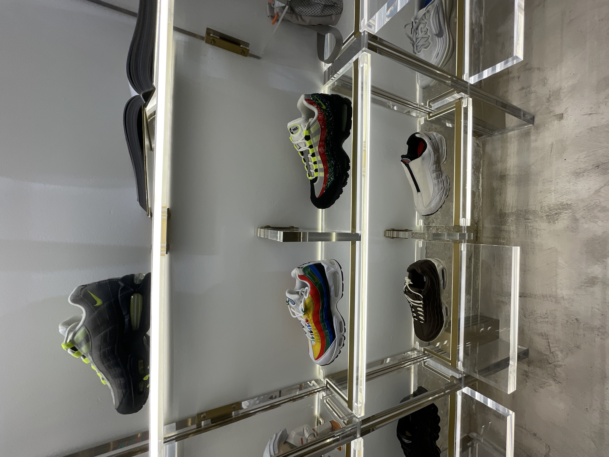 Tourist documents Nike displays and narrow Barcelona streets