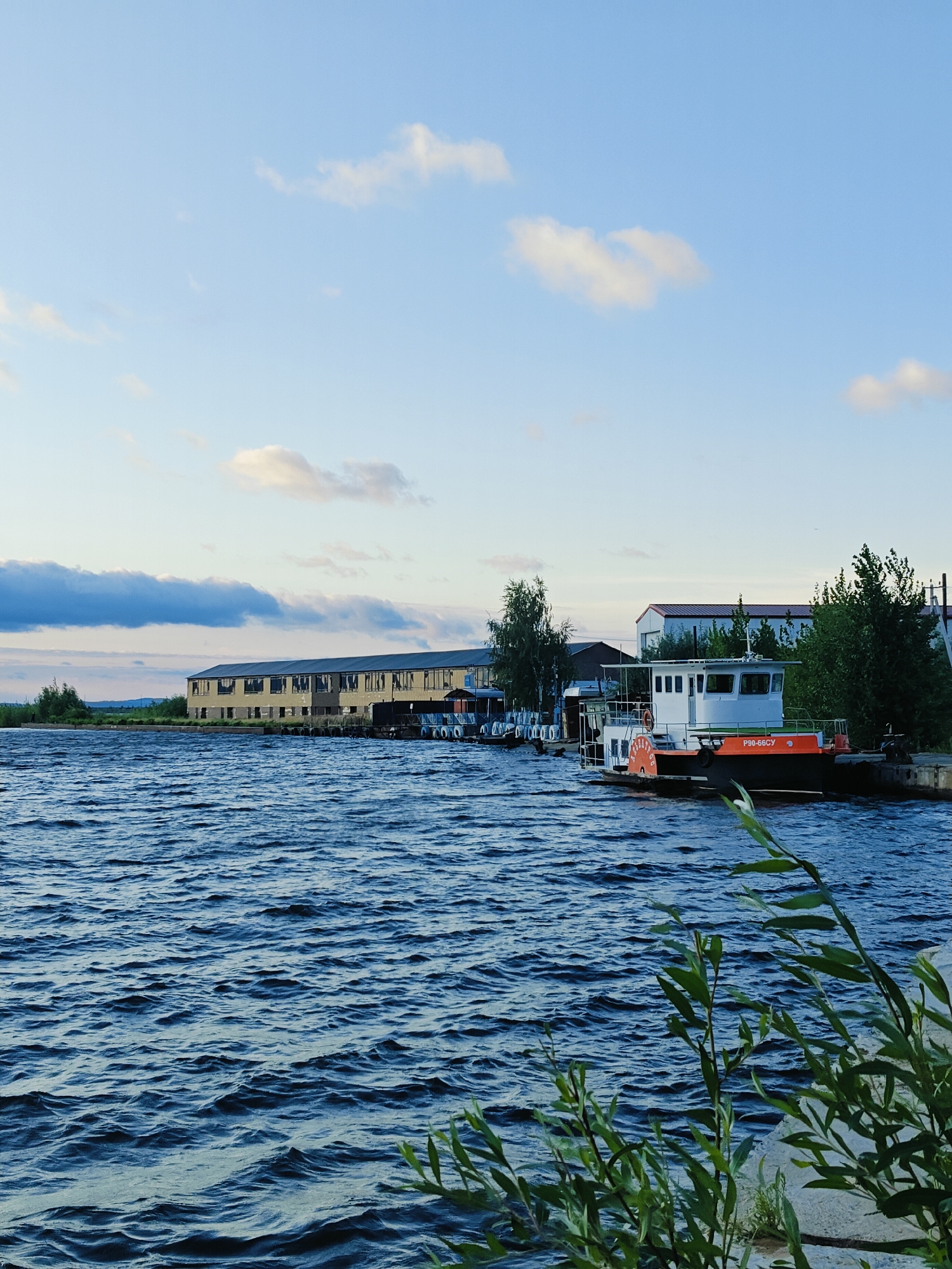 Kama River waterfront at golden hour, Chaikovsky