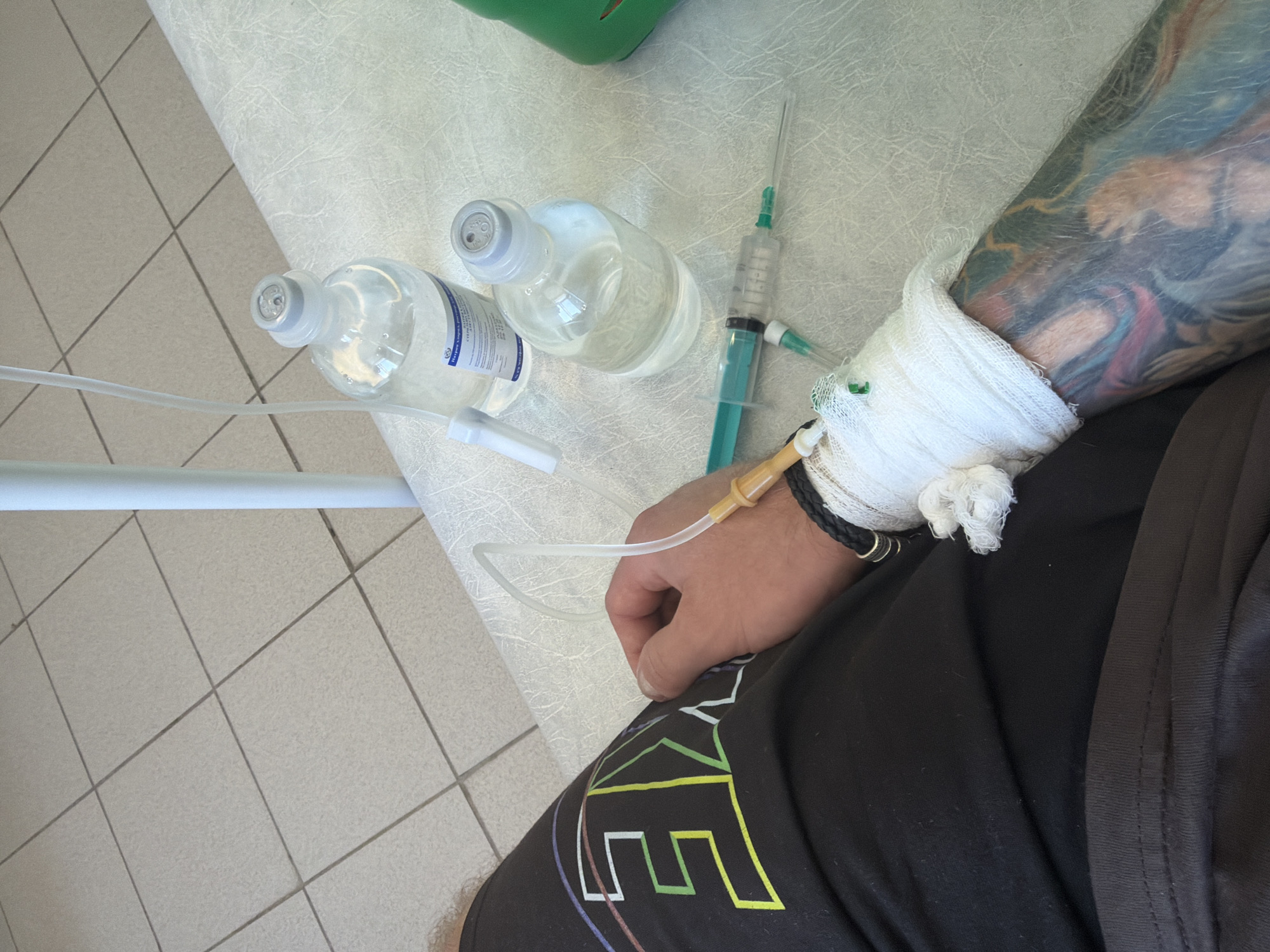 Patient receives IV treatment while enjoying latte in Chaikovsky