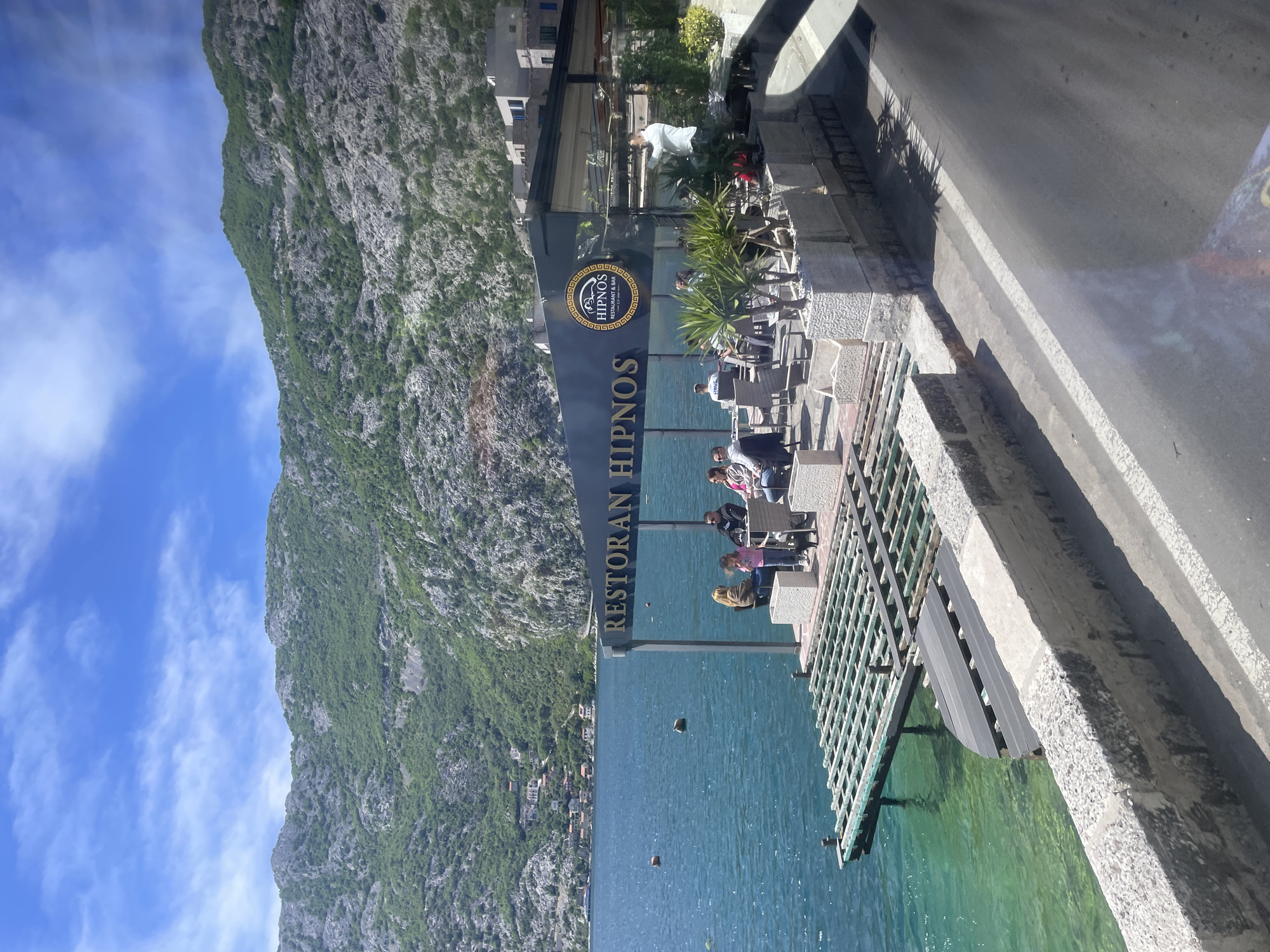 Sunny waterfront day captured in Risan, Montenegro