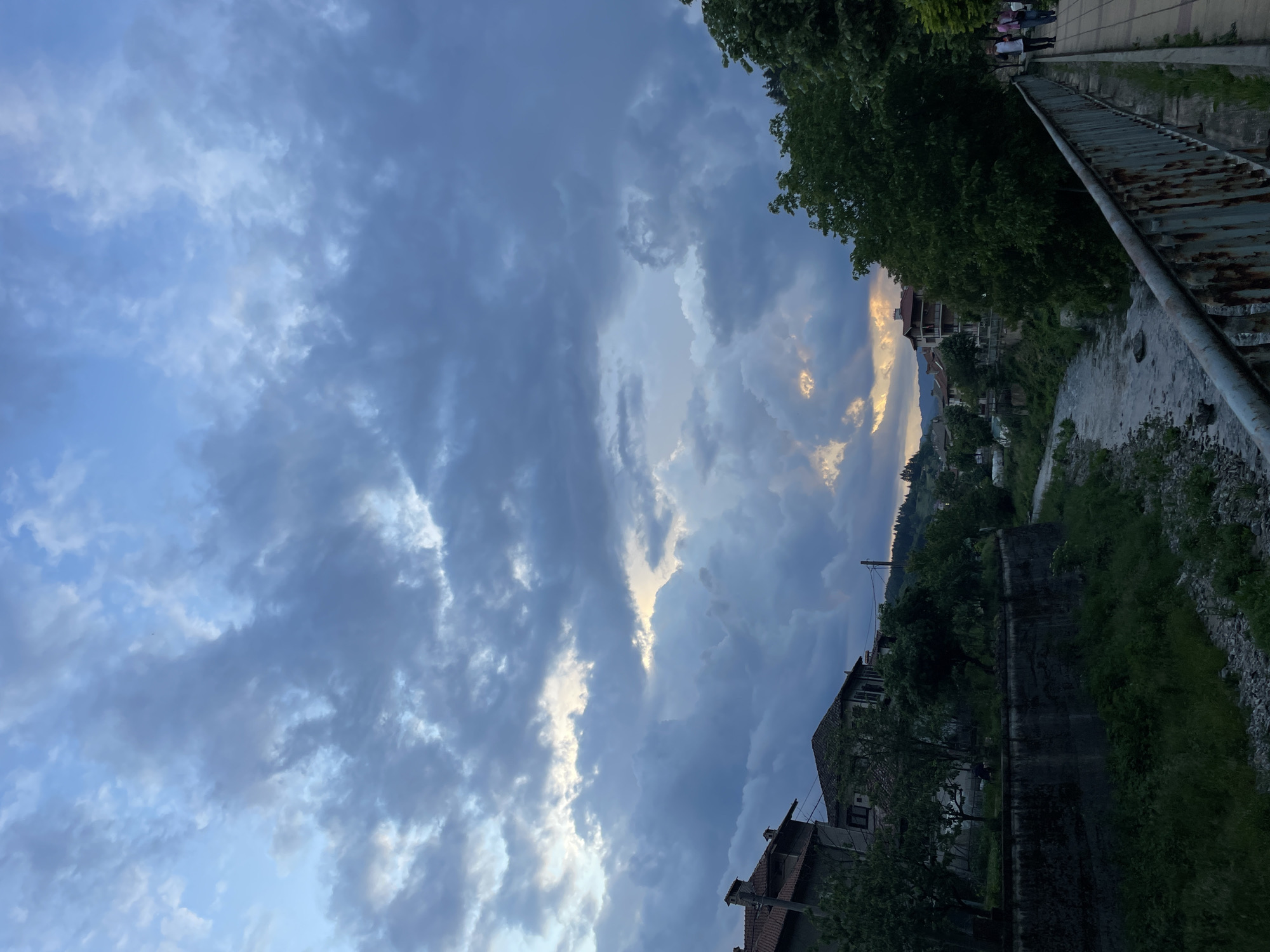 Storm clouds gather over Zlatograd riverside during evening hours