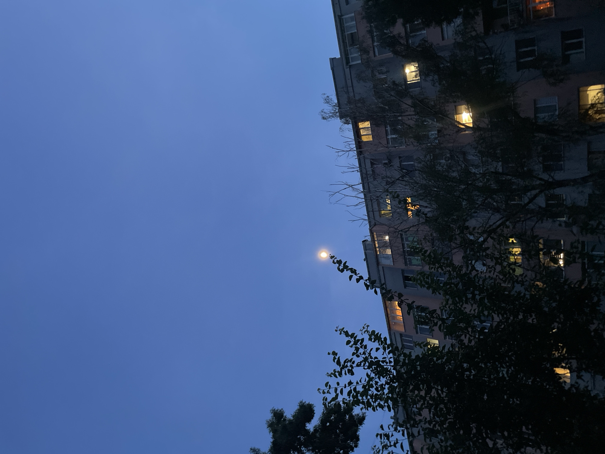 Apartment evening: balcony views, guitar, and city lights