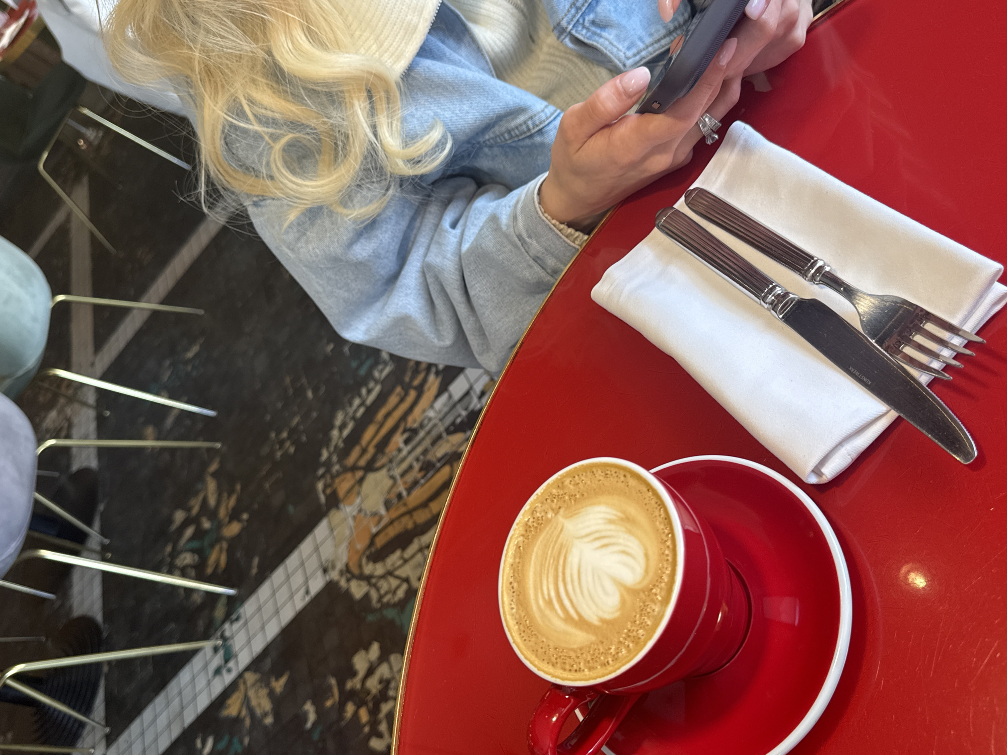 Woman enjoys breakfast at Moscow cafe Friday morning