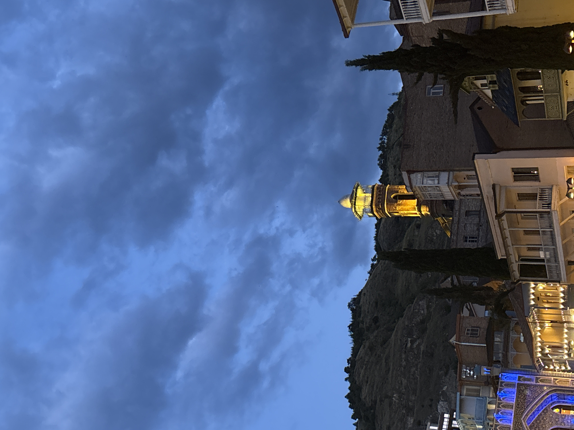 Tbilisi Old Town at dusk: sulfur domes, riverside, and lit streets
