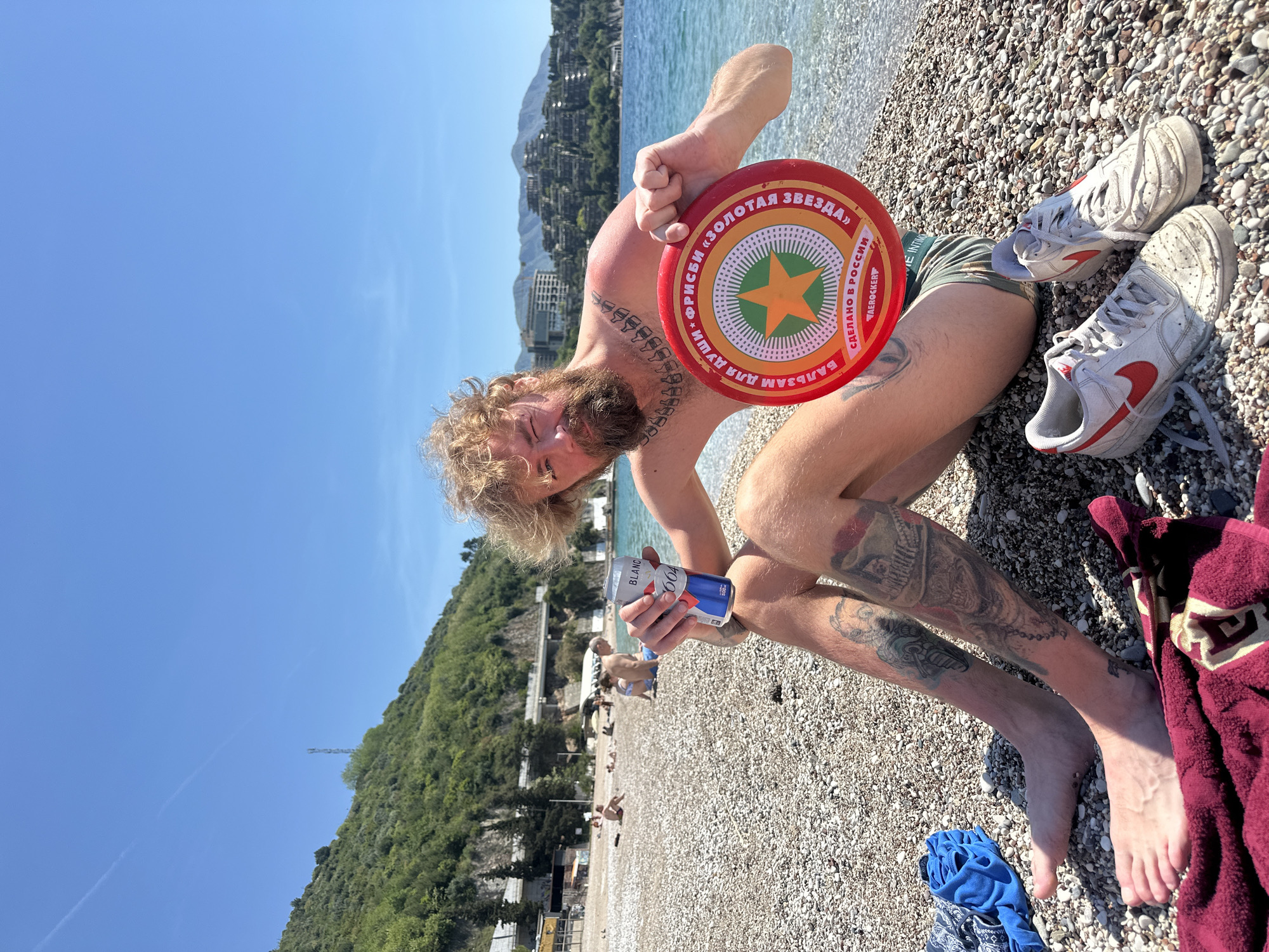 Tattooed man with frisbee spotted on Budva beach