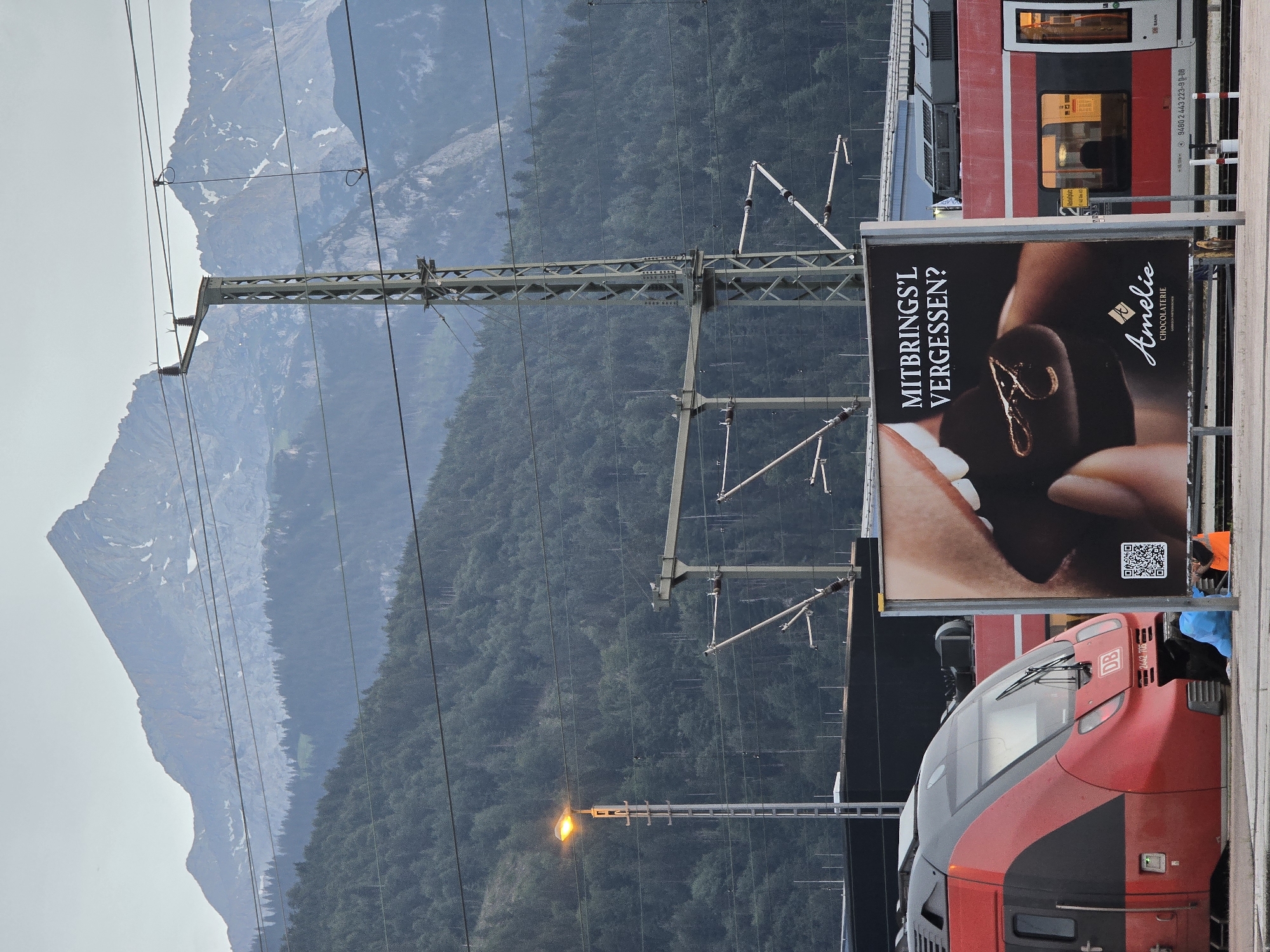 An evening at Garmisch-Partenkirchen station with Alpine backdrop