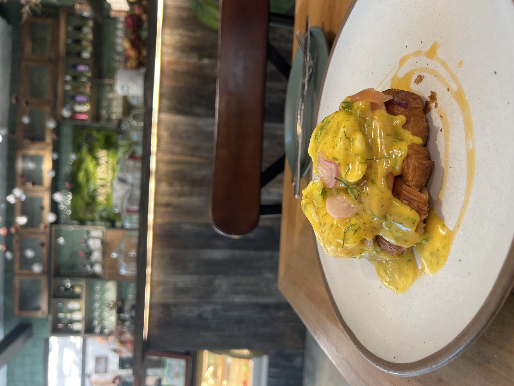 Breakfast dish documented on wooden table in Nha Trang