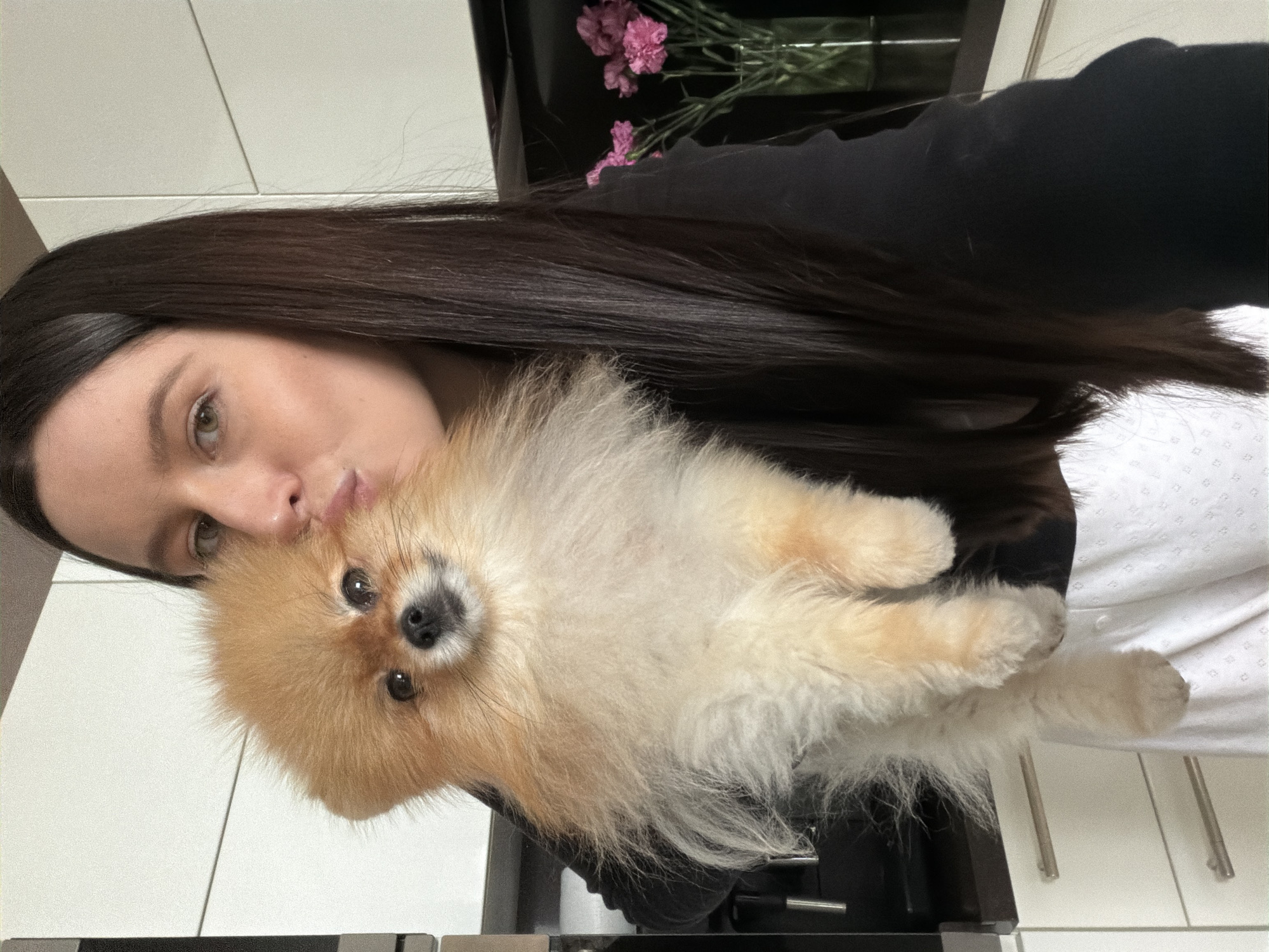 Woman takes selfie with fluffy dog in Khimki