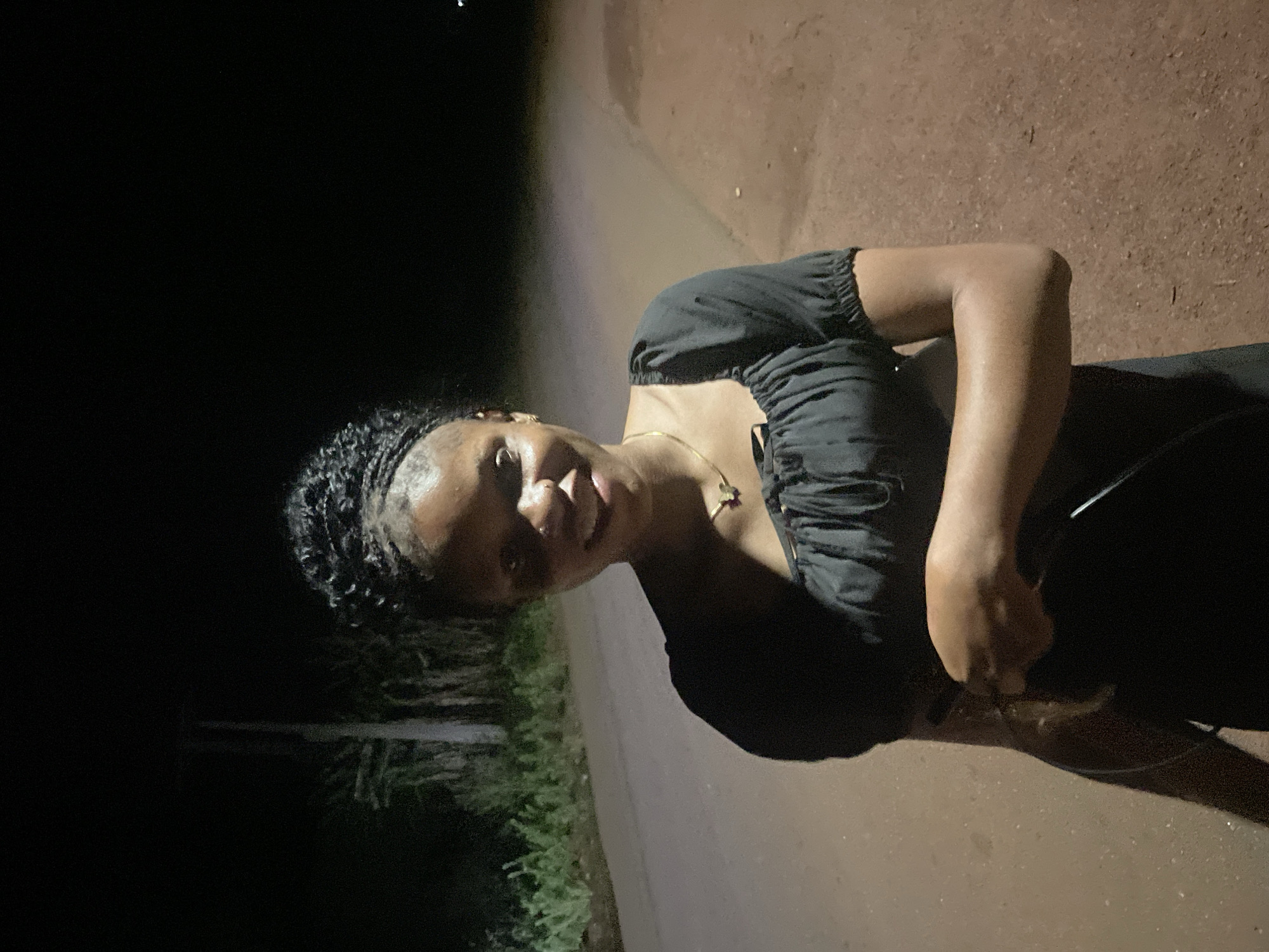 Woman observed on dirt road in Ogbe, Nigeria