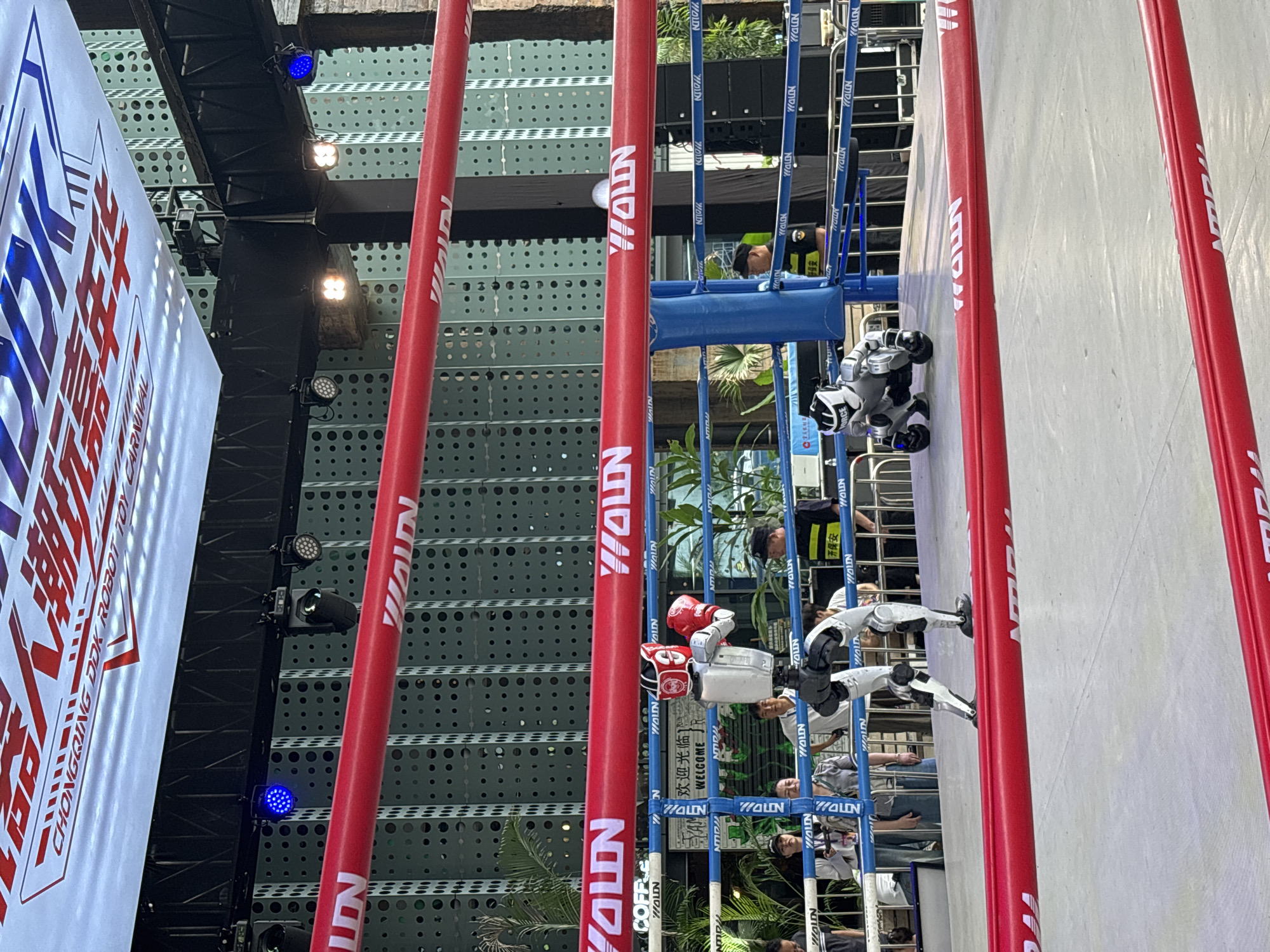 Robot boxing and obstacle courses at a Dadukou robotics competition