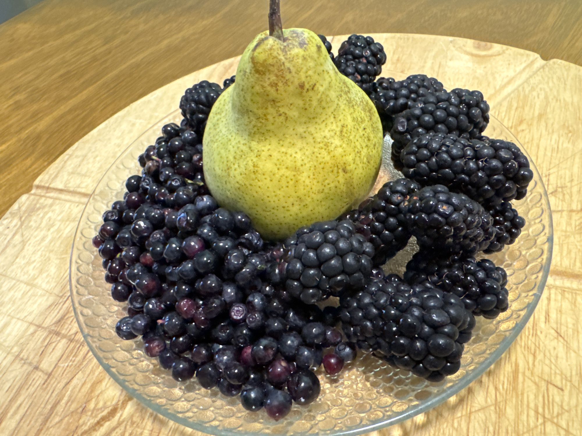 Fresh berries and pear in a glass bowl, Sofia