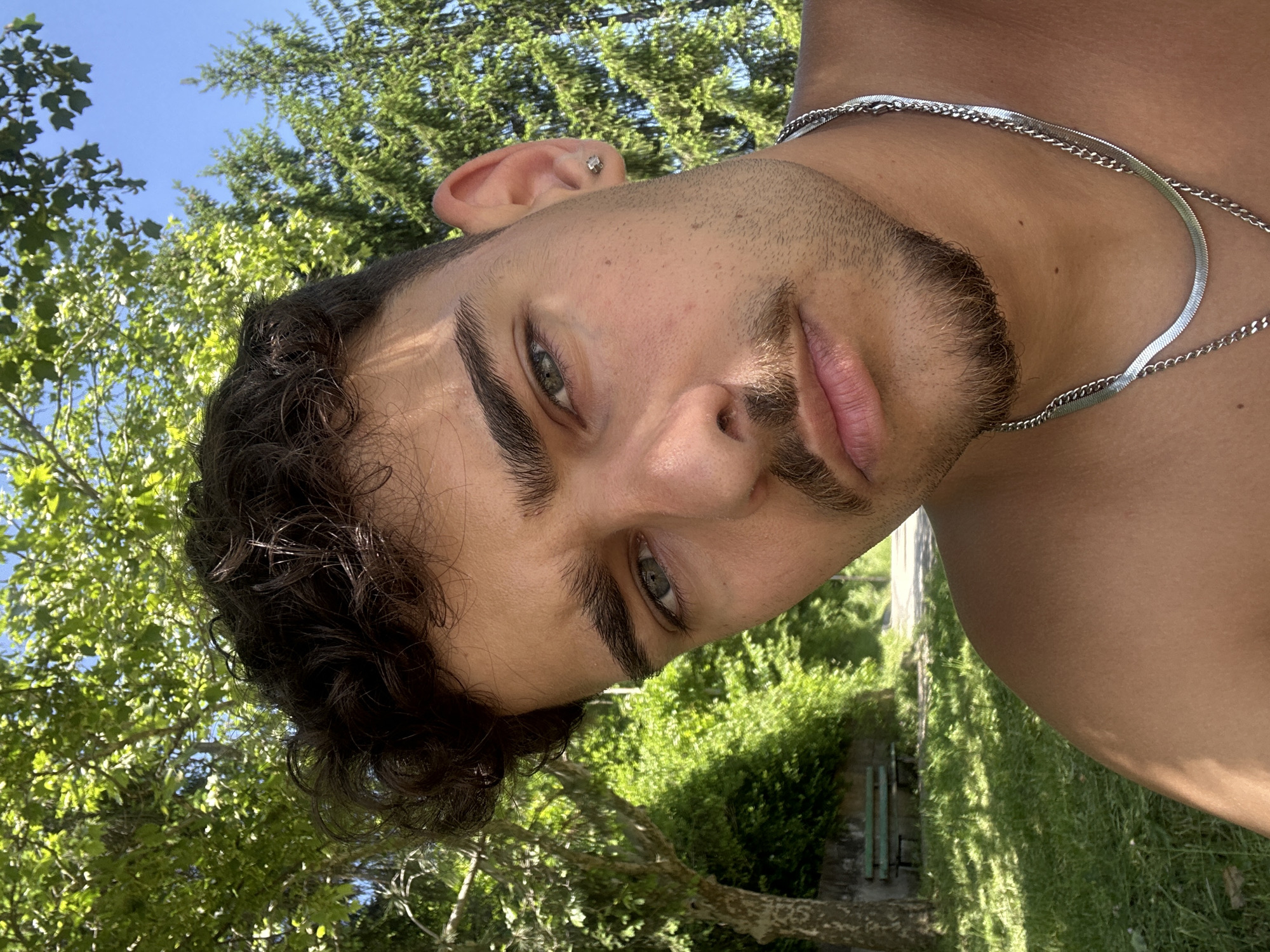 Young man films himself at sports field in Bulgaria