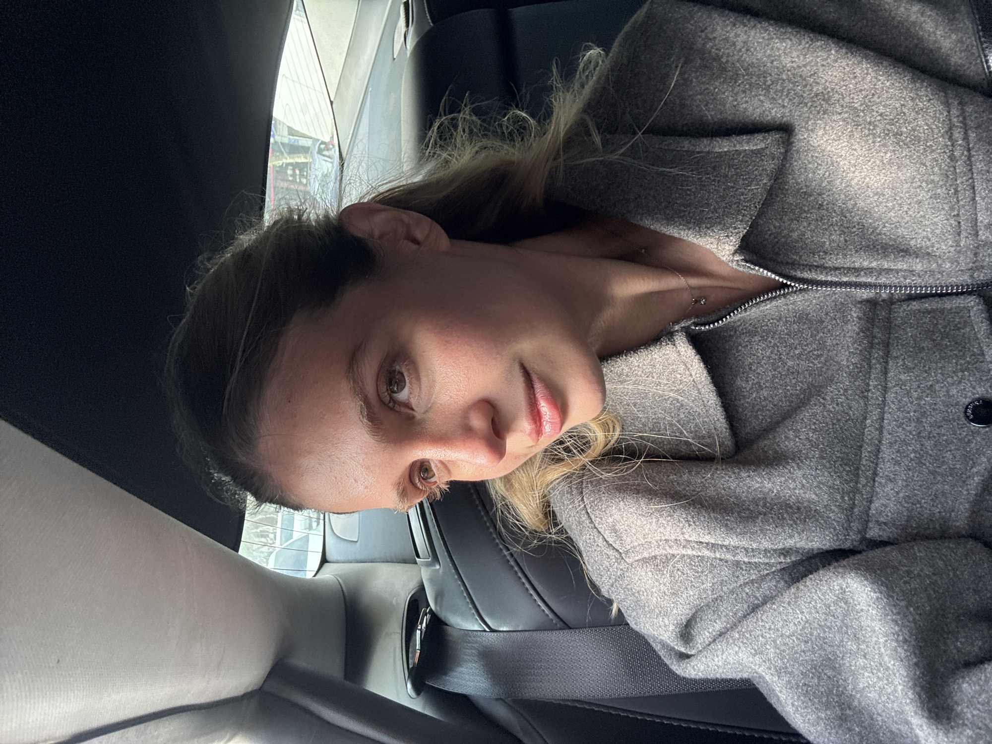 Woman photographed in car in Tbilisi, Georgia