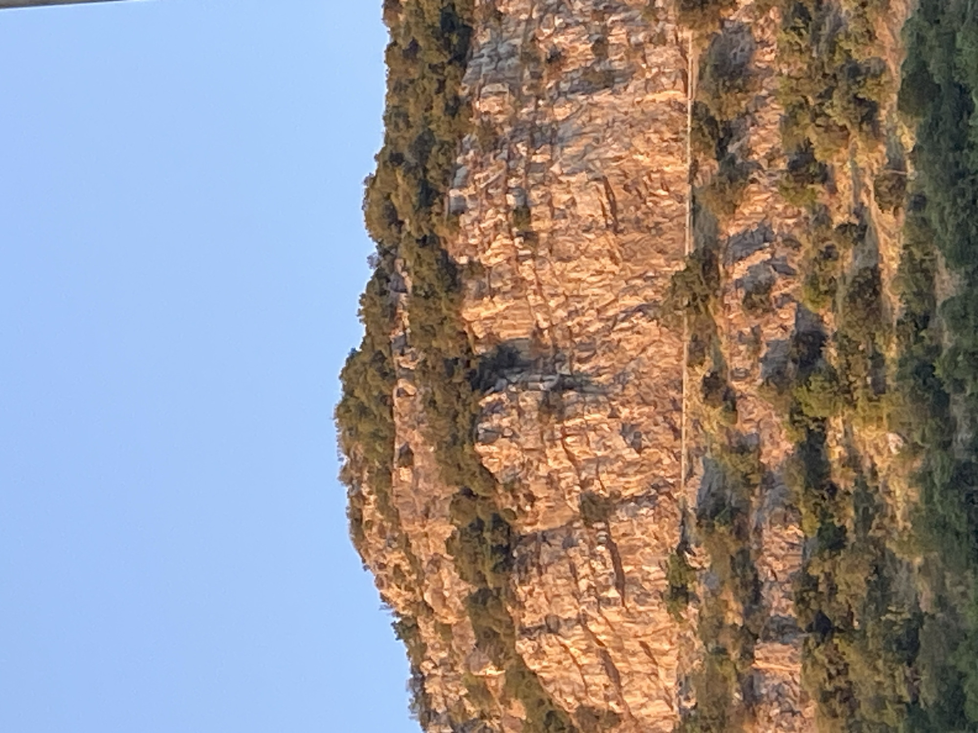 Summer evening light across Budva's streets, hills, and coastline