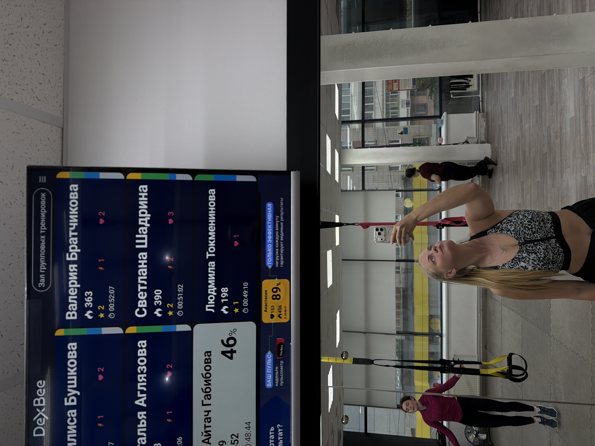 Woman documents workout routine with selfies at Izhevsk gym