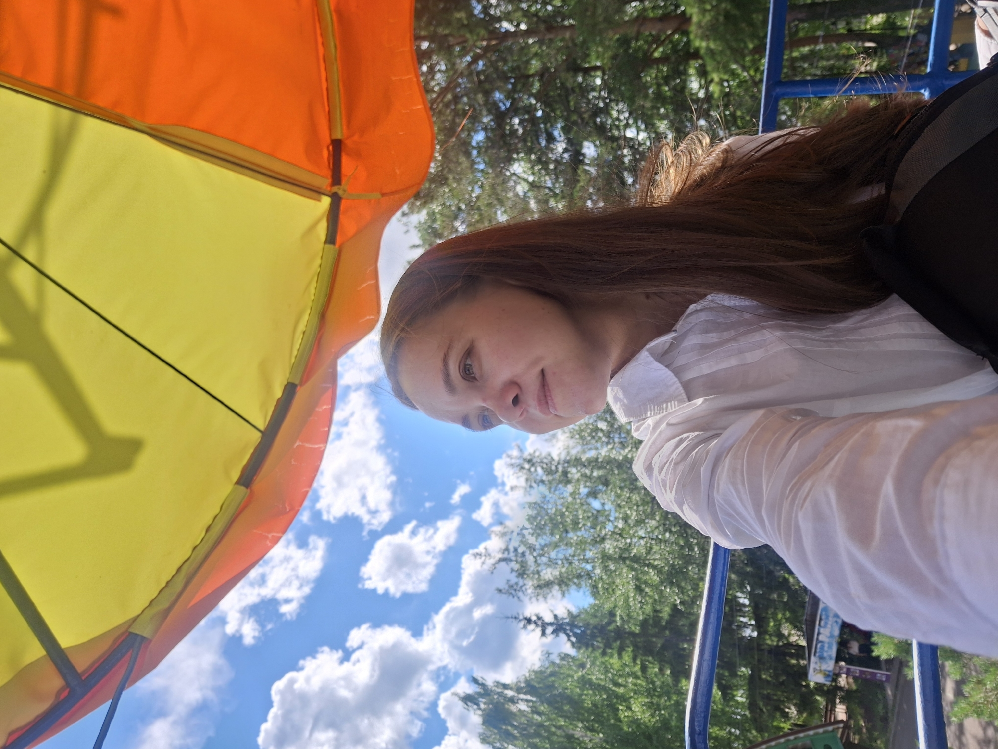 Sunny afternoon out in Chaikovsky, Ferris wheel and waterside views