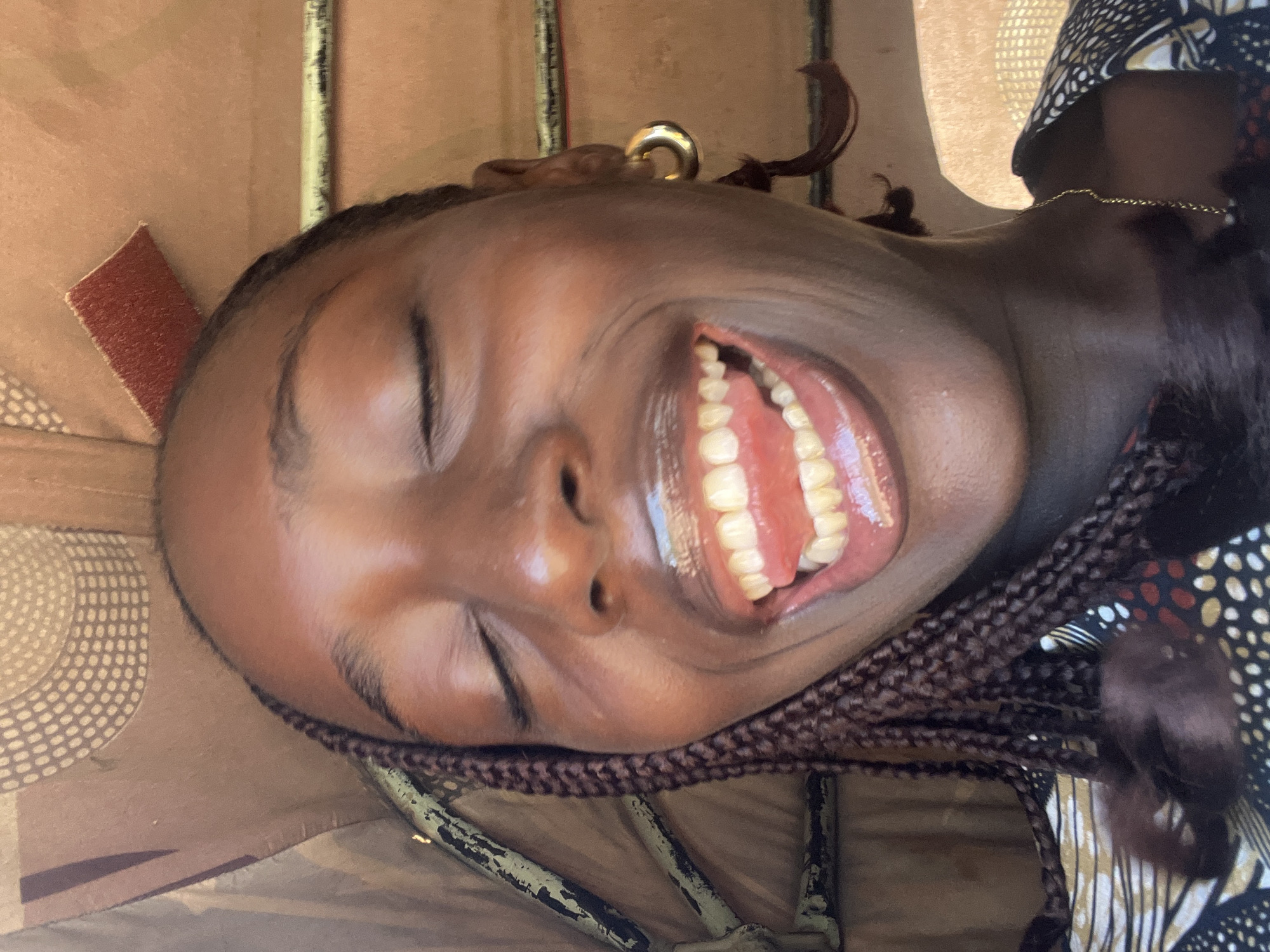 Young woman captures joyful auto-rickshaw journey in Nigerian village