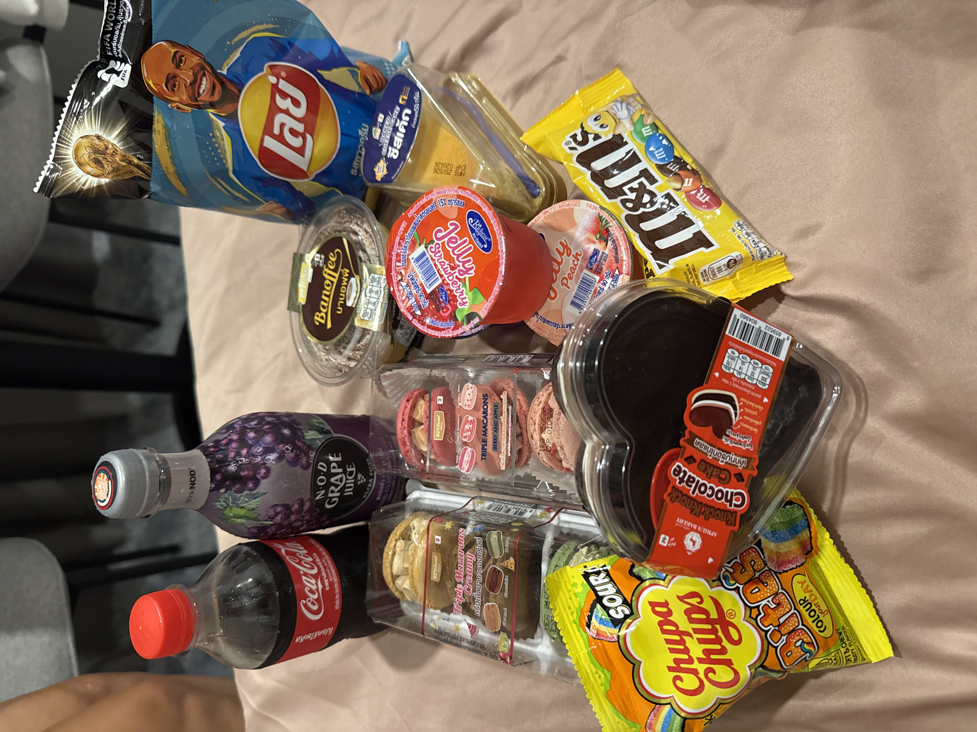 Snack spread documented in Kathu, Thailand hotel room