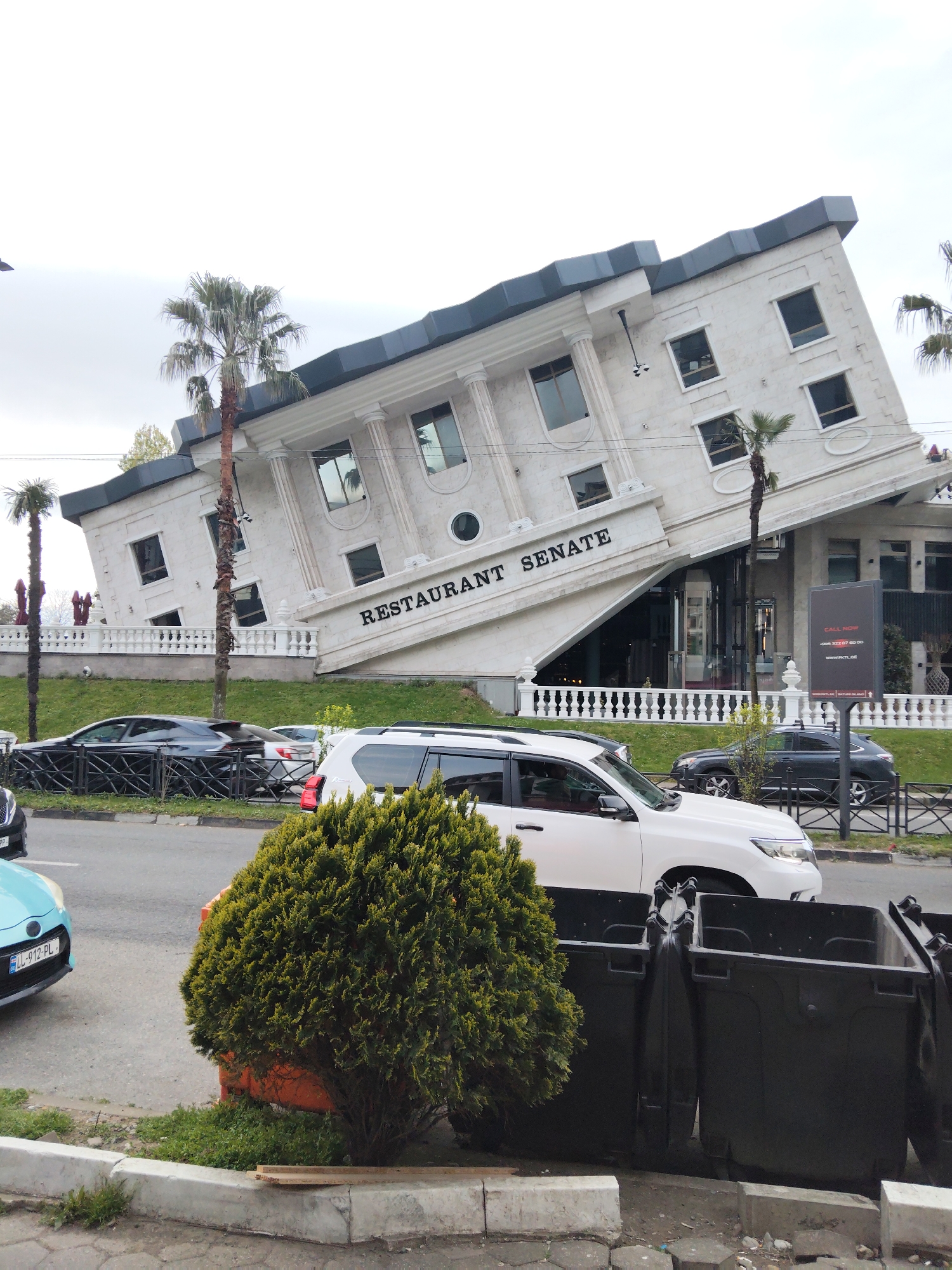 Tilted Restaurant Senate building observed in Batumi, Georgia