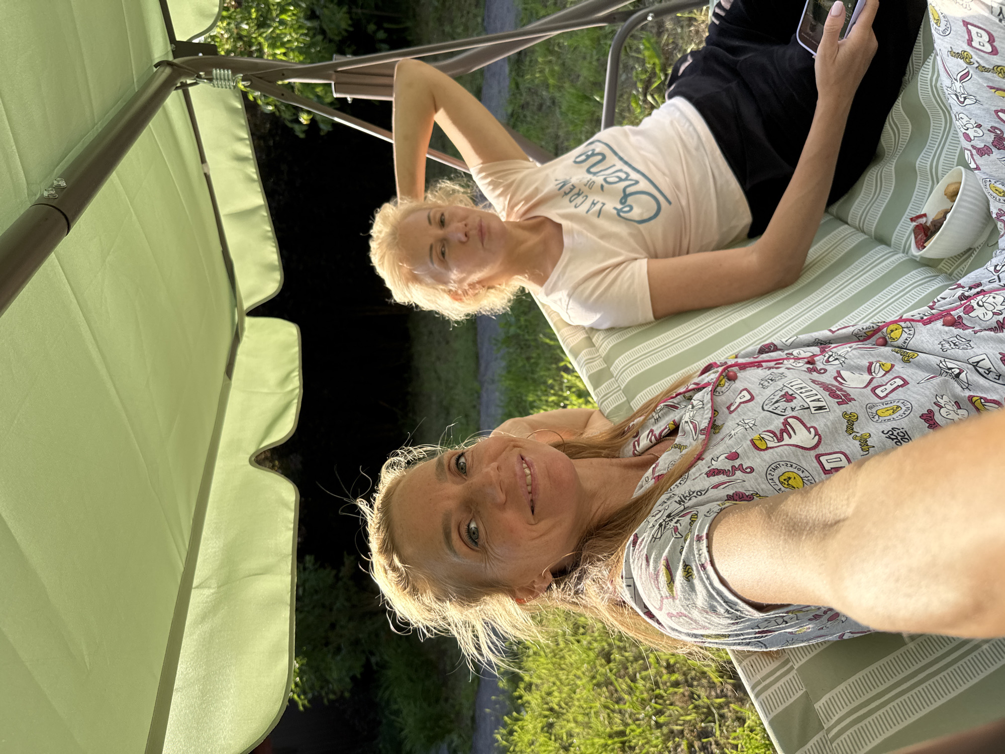 Slow summer day on a backyard swing in Steklyannyi