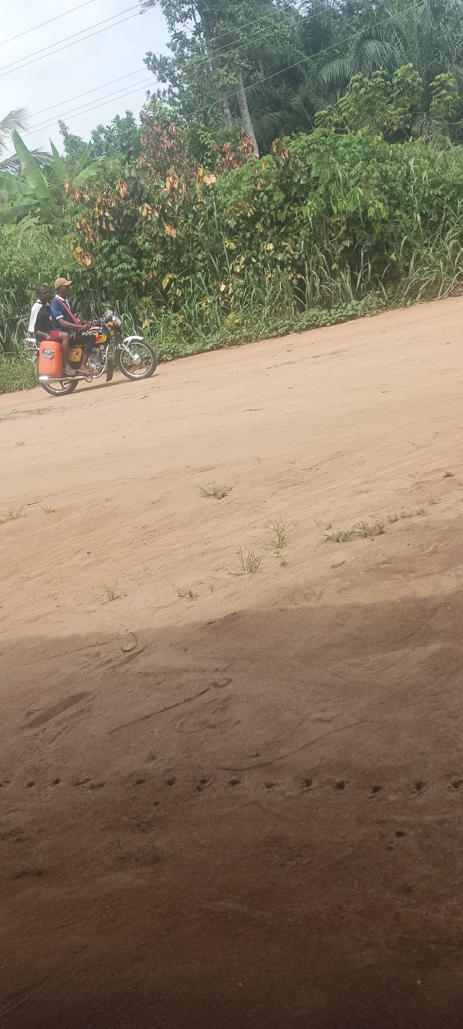 Rural traffic documented on dirt roads in Amauzu, Nigeria