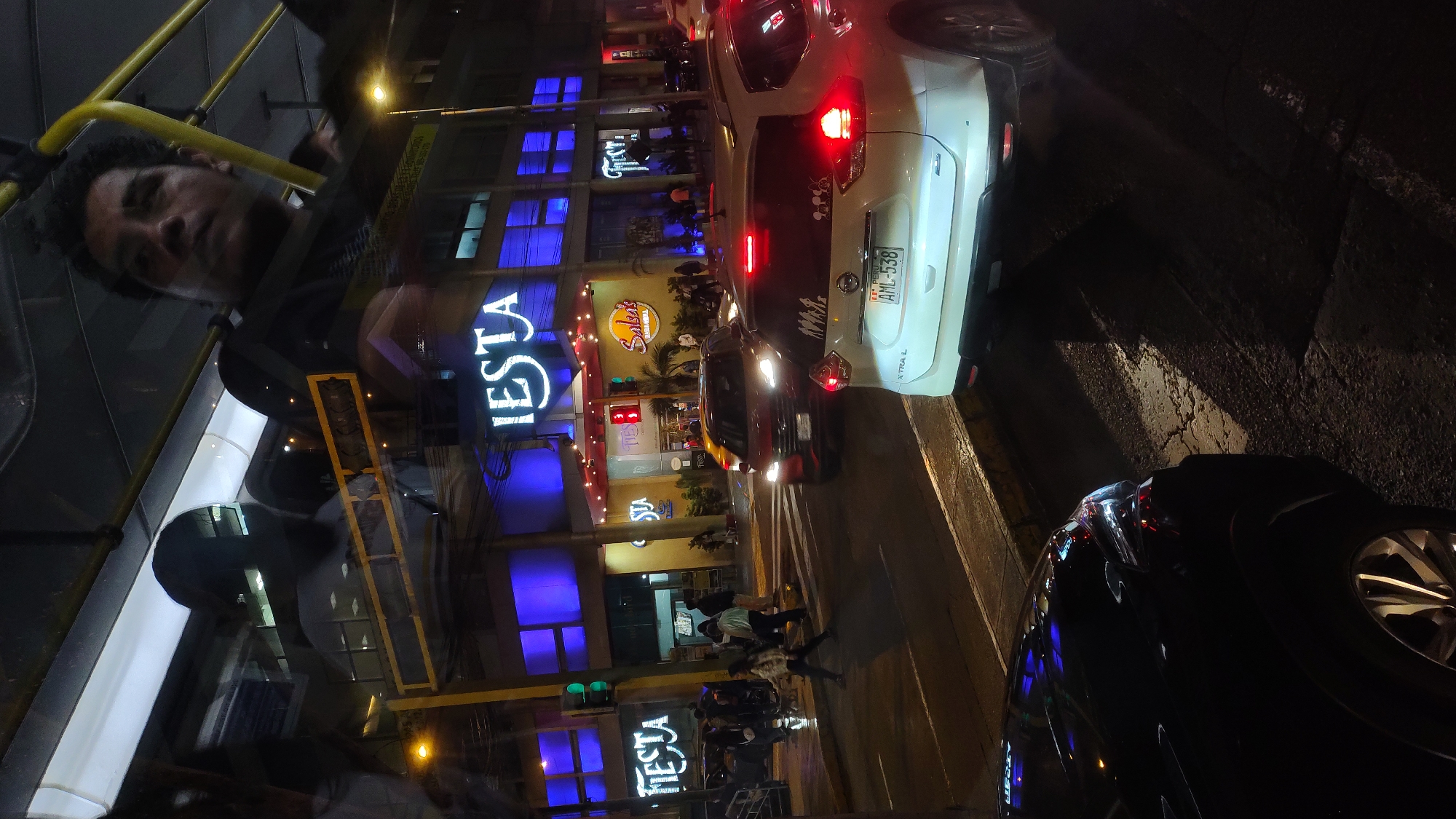 Nighttime vehicle reflection captured in Miraflores, Peru