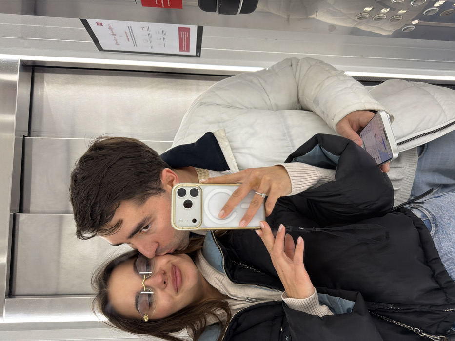 Couple Takes Mirror Selfie in Porto Elevator