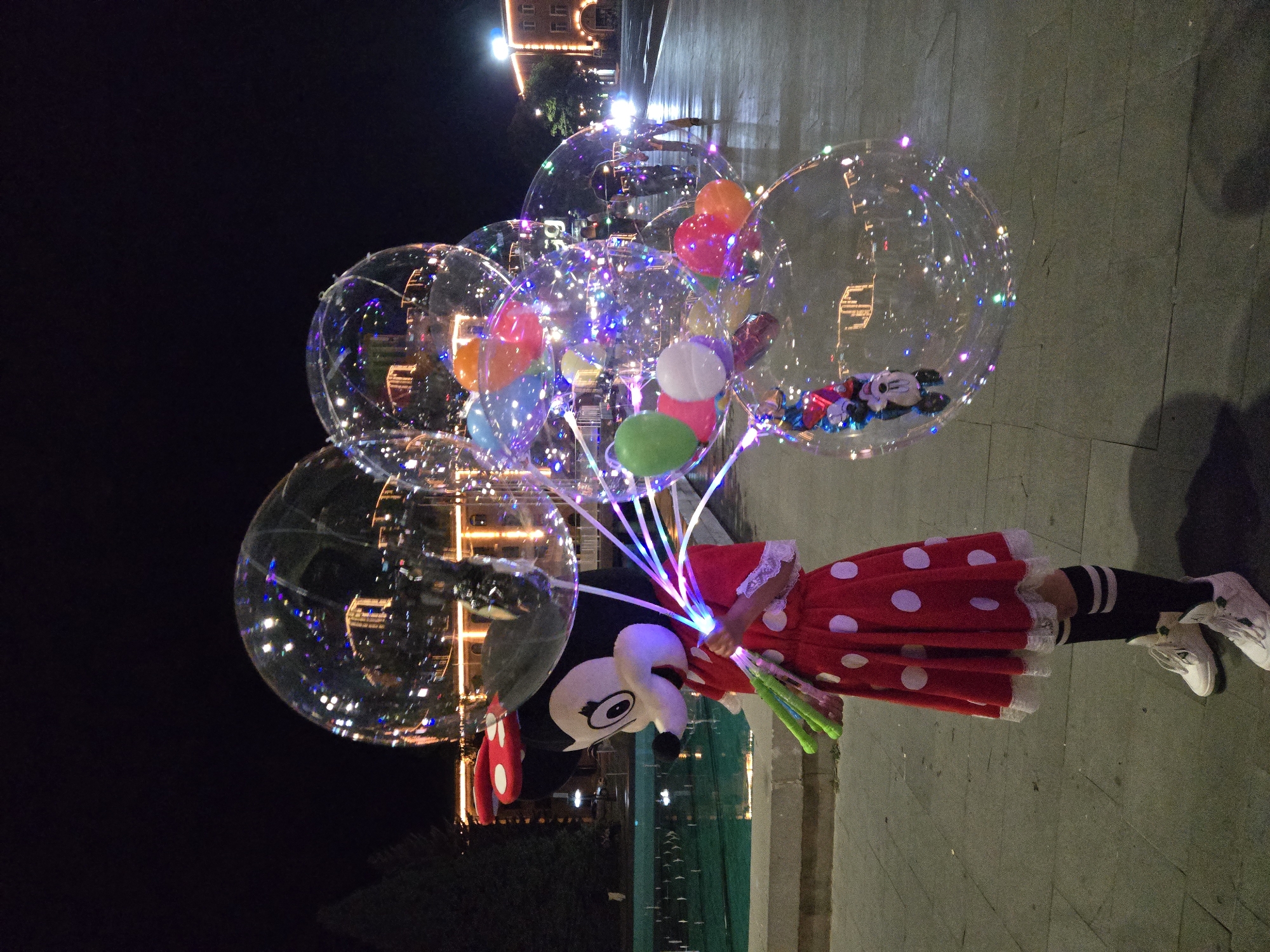 City evening: parks, lit fountains, street food, and festive crowds