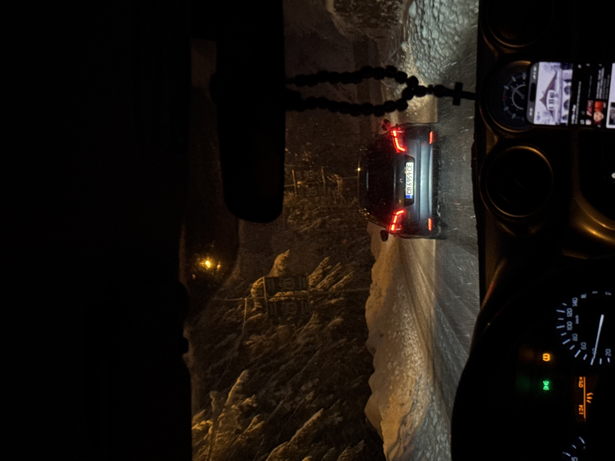 Night driving through snow near Пампорово ski resort