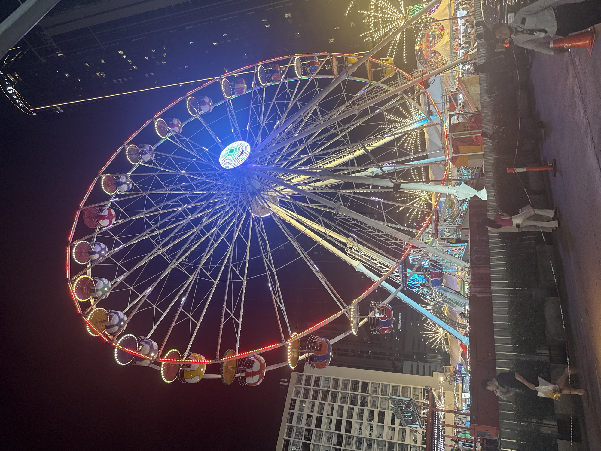 Bangkok night fair: rides, street food, and carnival games