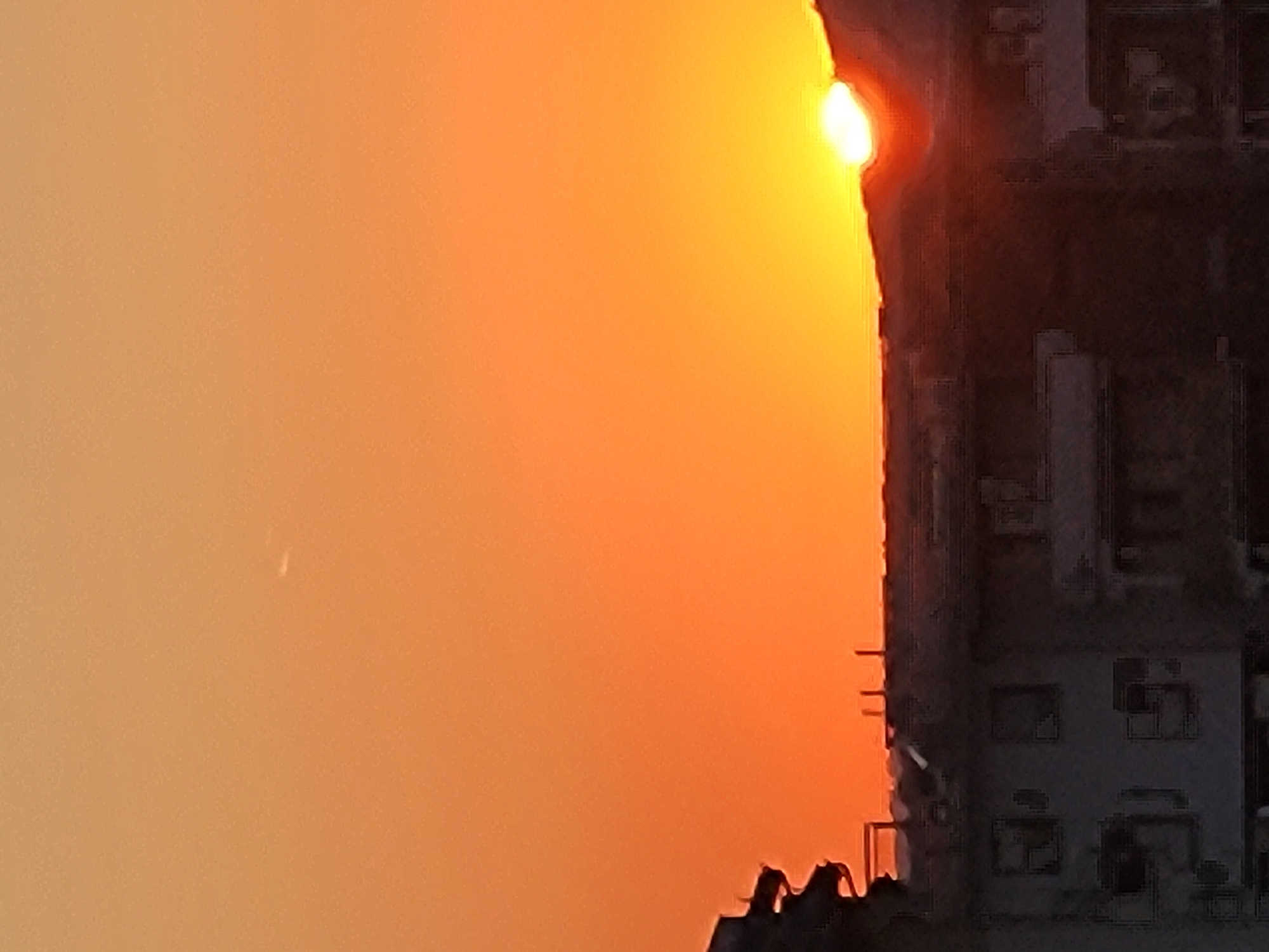 Urban sunset caught from multiple angles in quick succession