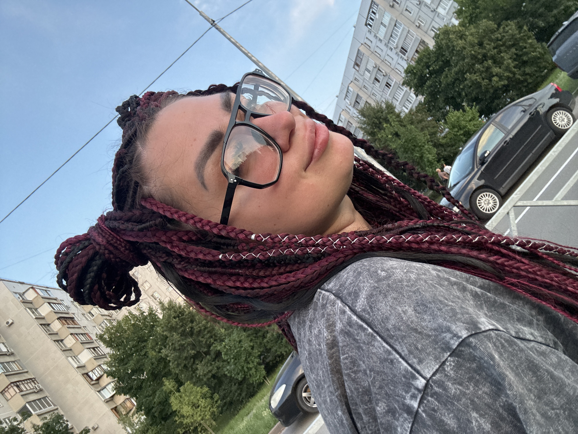 Selfie session on a Tolyatti street at golden hour