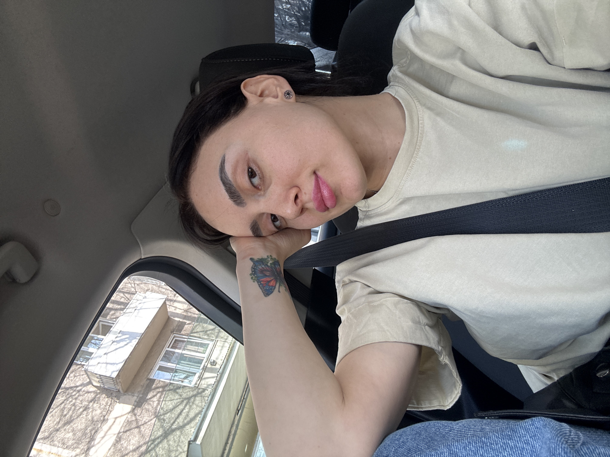 Woman driving through Tbilisi captured in multiple vehicle photos