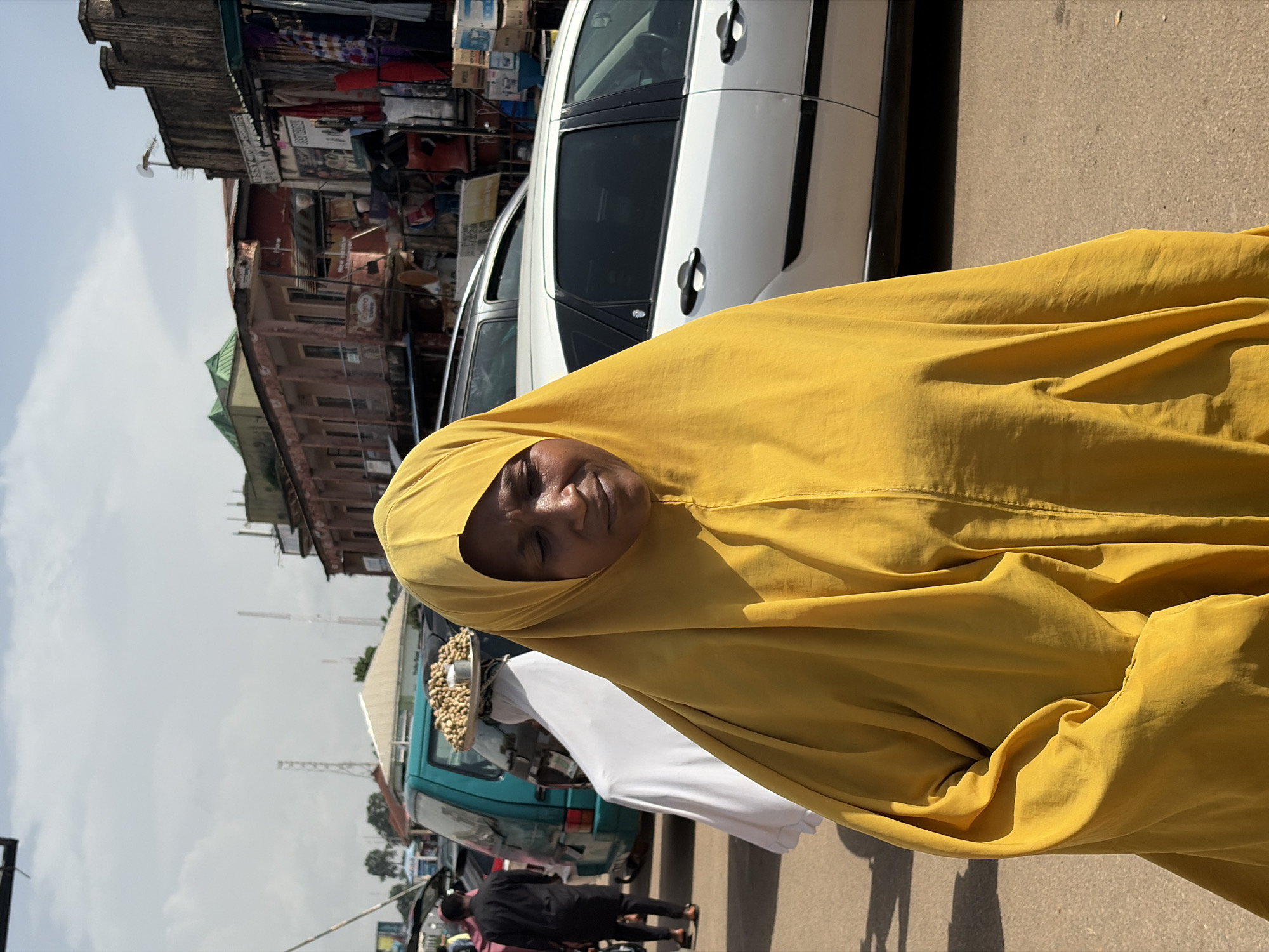 Midday street and market life across Jos, Nigeria