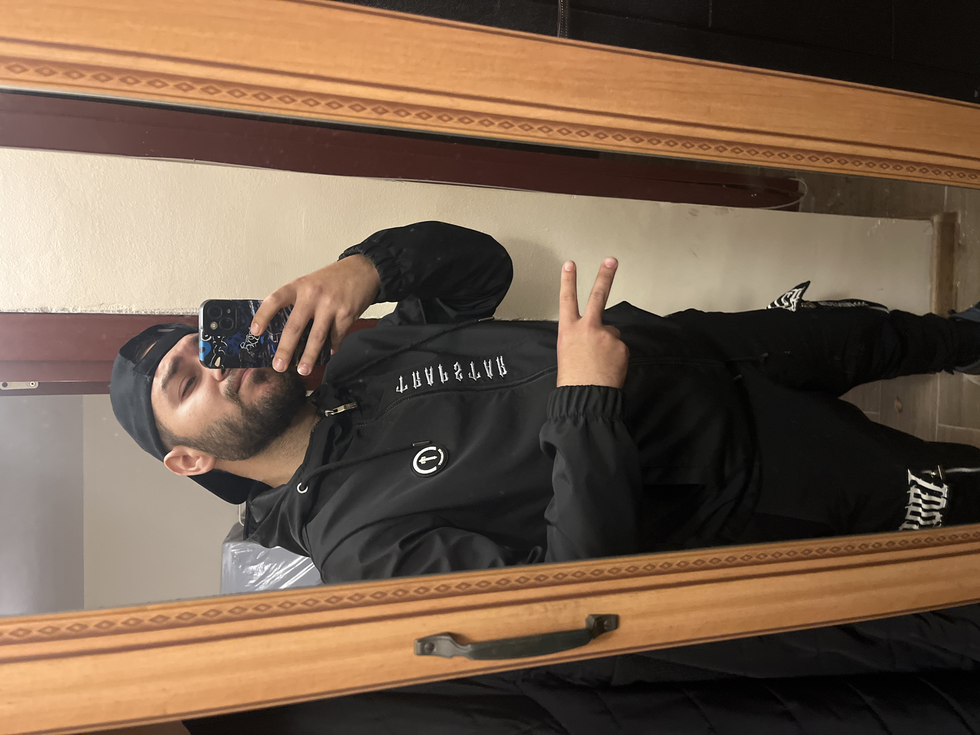 Man takes mirror selfies in Veliko Tarnovo apartment