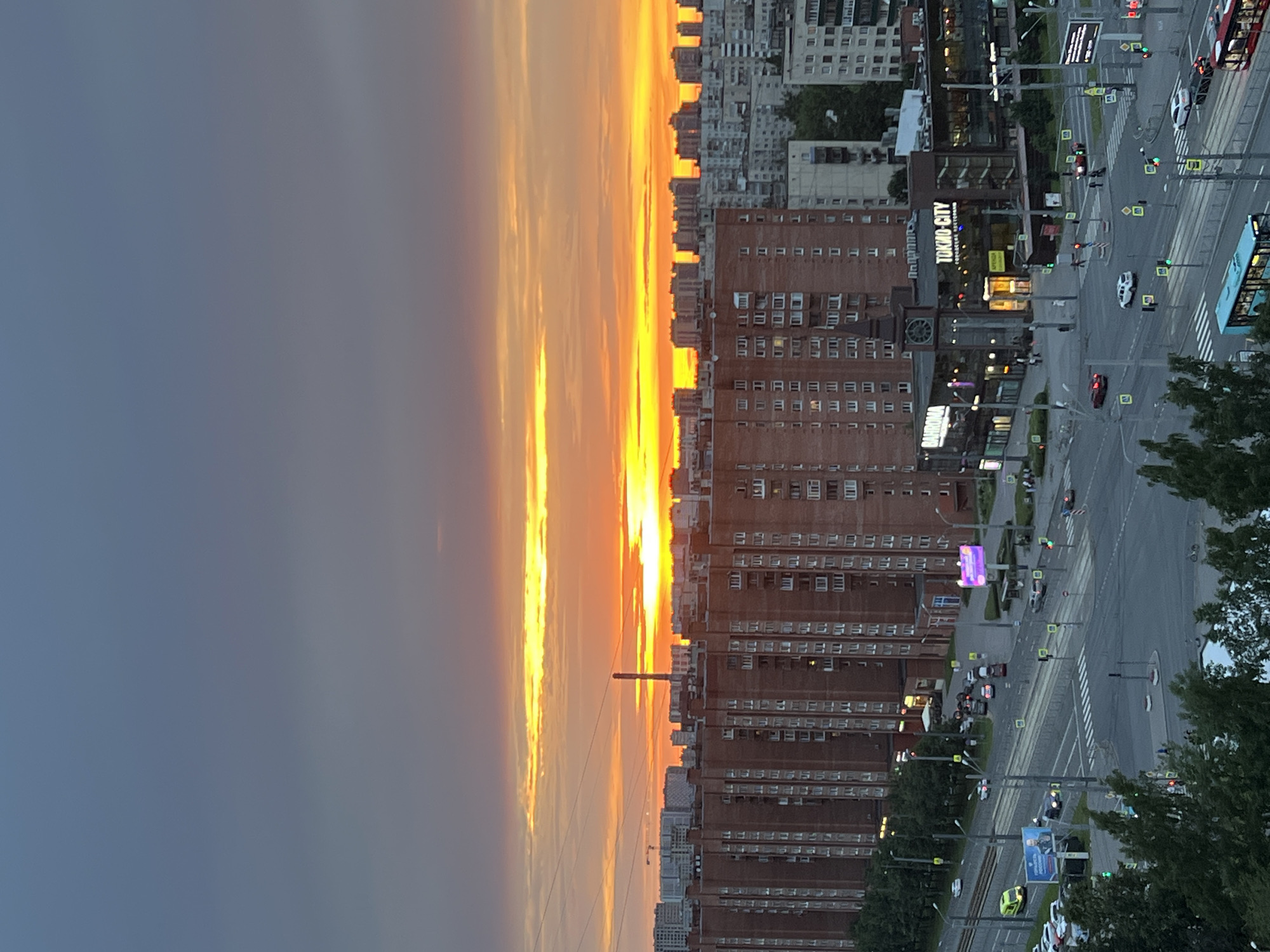 City at golden hour, rooftops to intersections